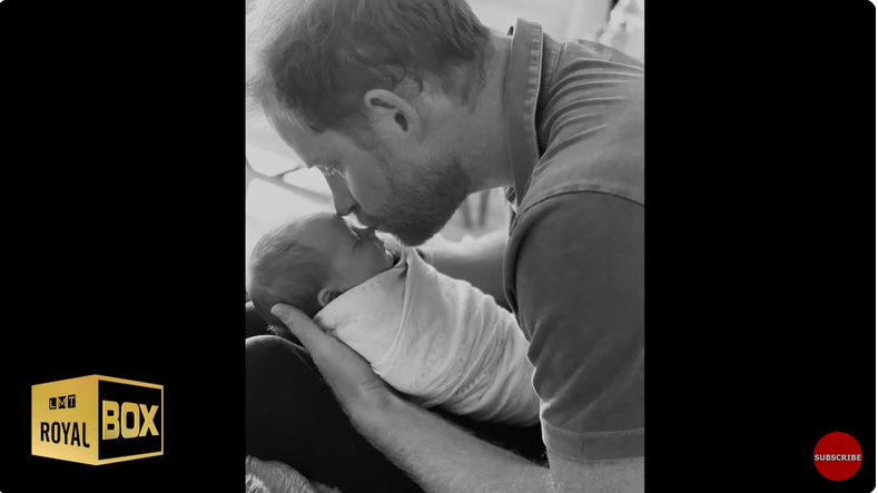 Prince Harry, Duke of Sussex holding Archie Harrison Mountbatten-Windsor at home from a YouTube video dated December 15, 2022 | Source: Youtube/@LMT