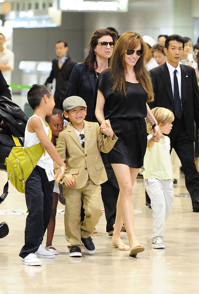 Angelina Jolie with her children Maddox, Pax, Zahara, Shiloh on July 26, 2010 in Narita, Japan | Photo: Getty Images