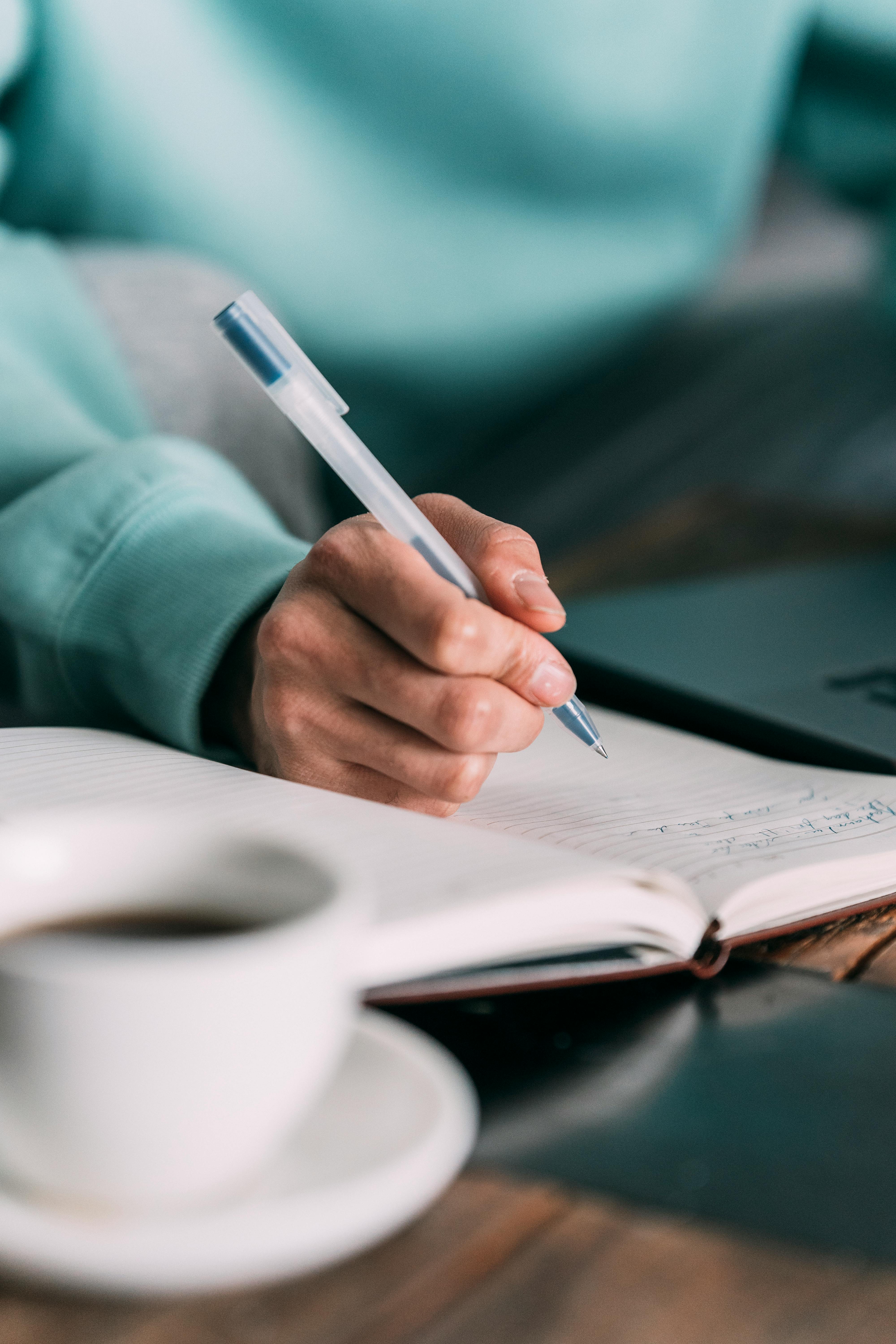 Man writing a list | Source: Pexels