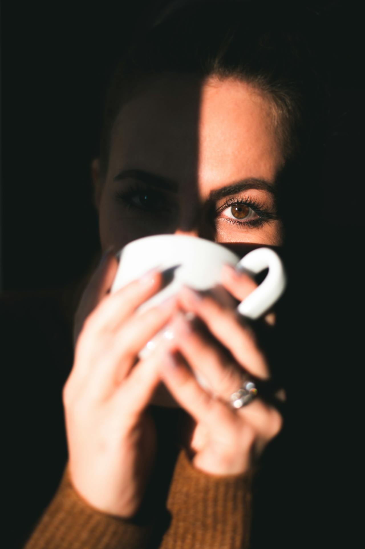 A woman drinking a beverage | Source: Pexels