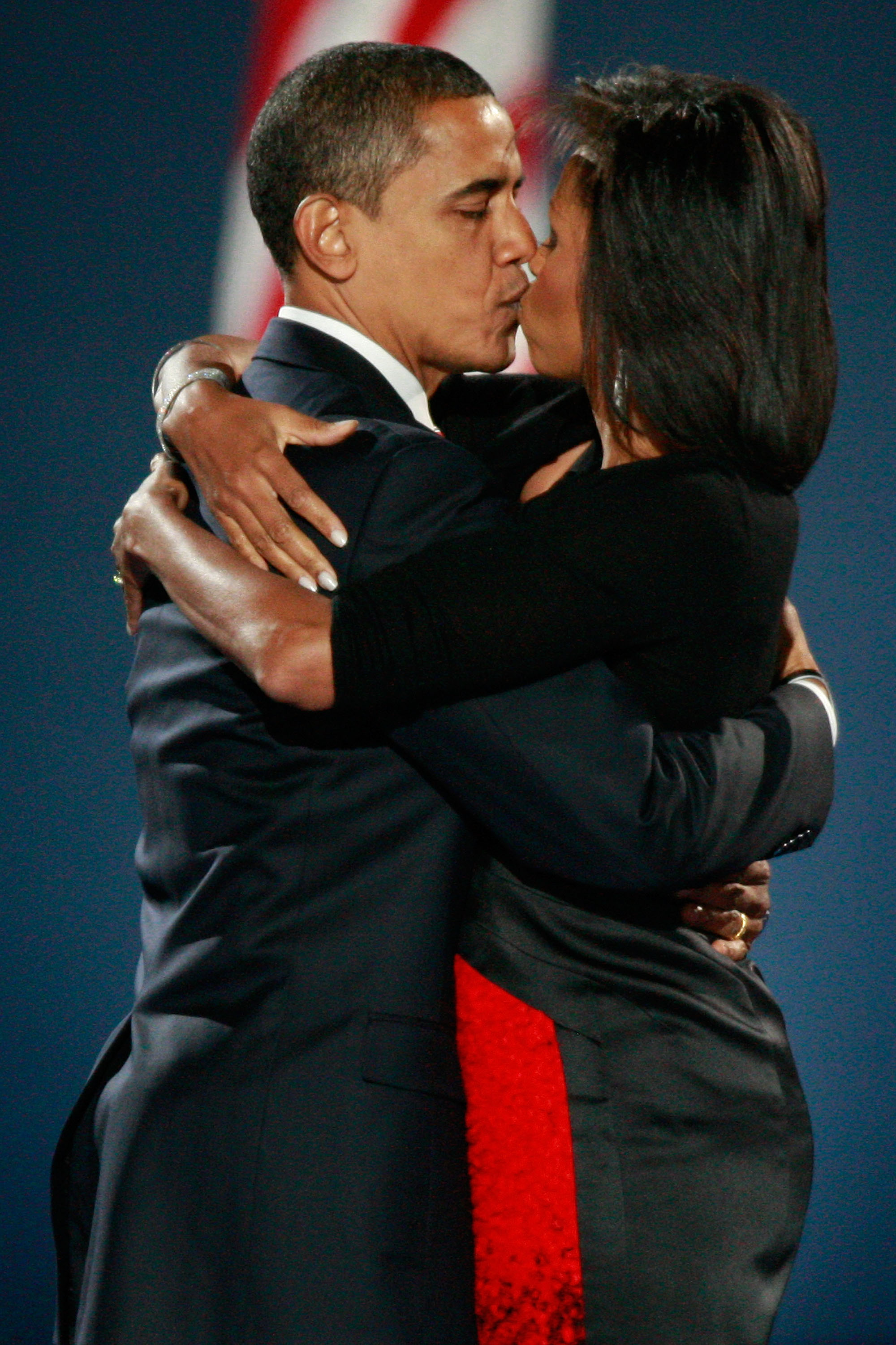 Barack and Michelle Obama sharing a kiss after he delivered his victory speech during an election night gathering in Grant Park on November 4, 2008, in Chicago, Illinois. | Source: Getty Images