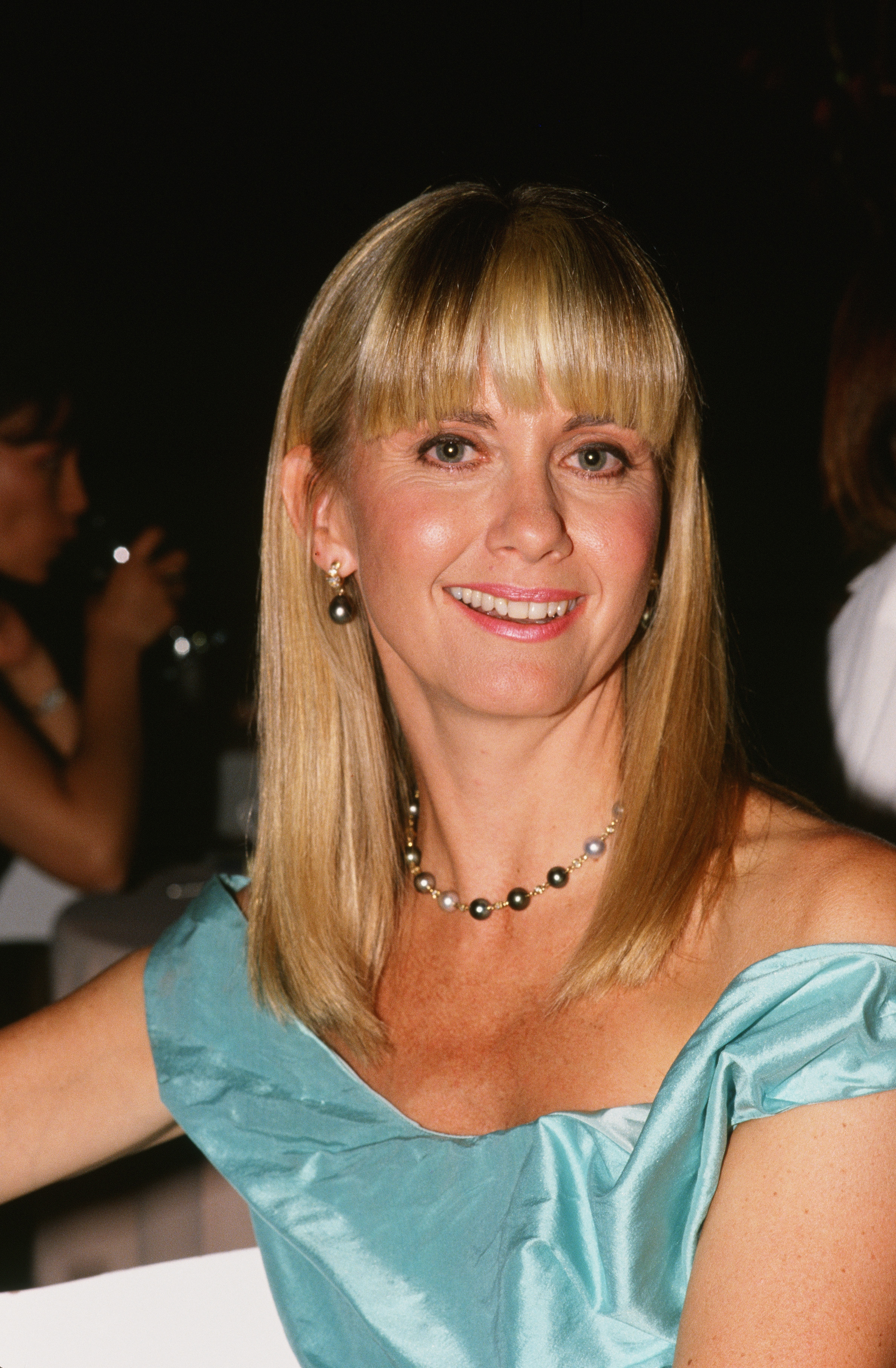 Olivia Newton-John poses at a children's benefit fundraiser in Los Angeles, California, in 1989. | Source: Getty Images