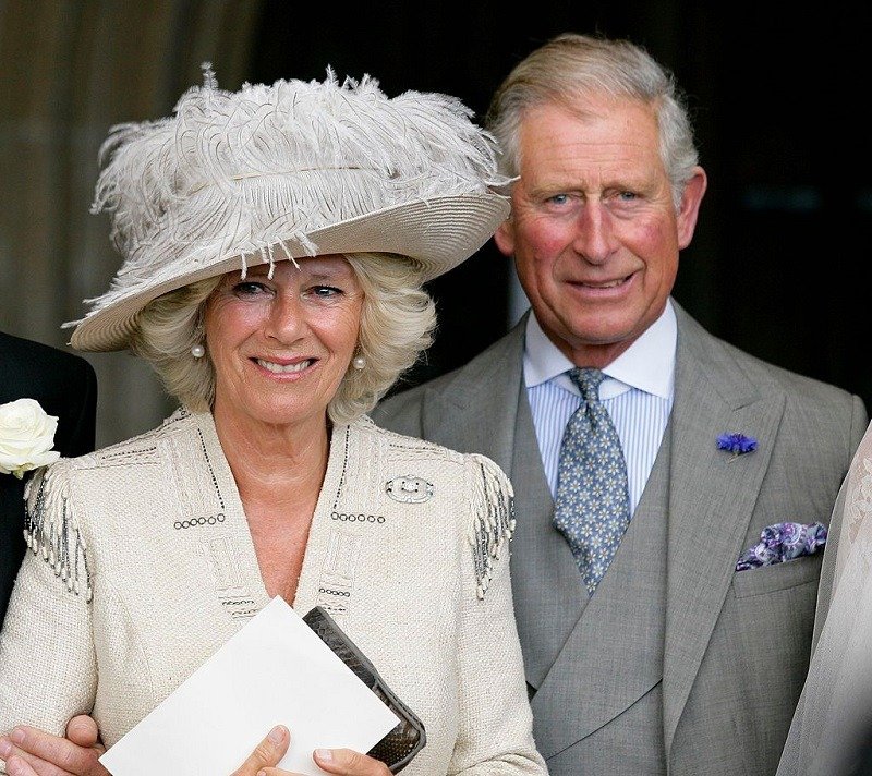 Camilla Parker-Bowles and Prince Charles at Ben Elliot and Mary-Clare Winwood's wedding in Cheltenham, England in September 2011. | Image: Getty Images.