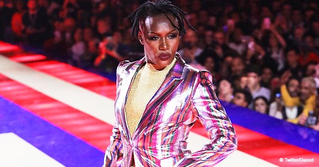 Grace Jones, 70, Flaunts Fit Figure in Gold Bodysuit & Rainbow Jacket on Paris Fashion Week Runway