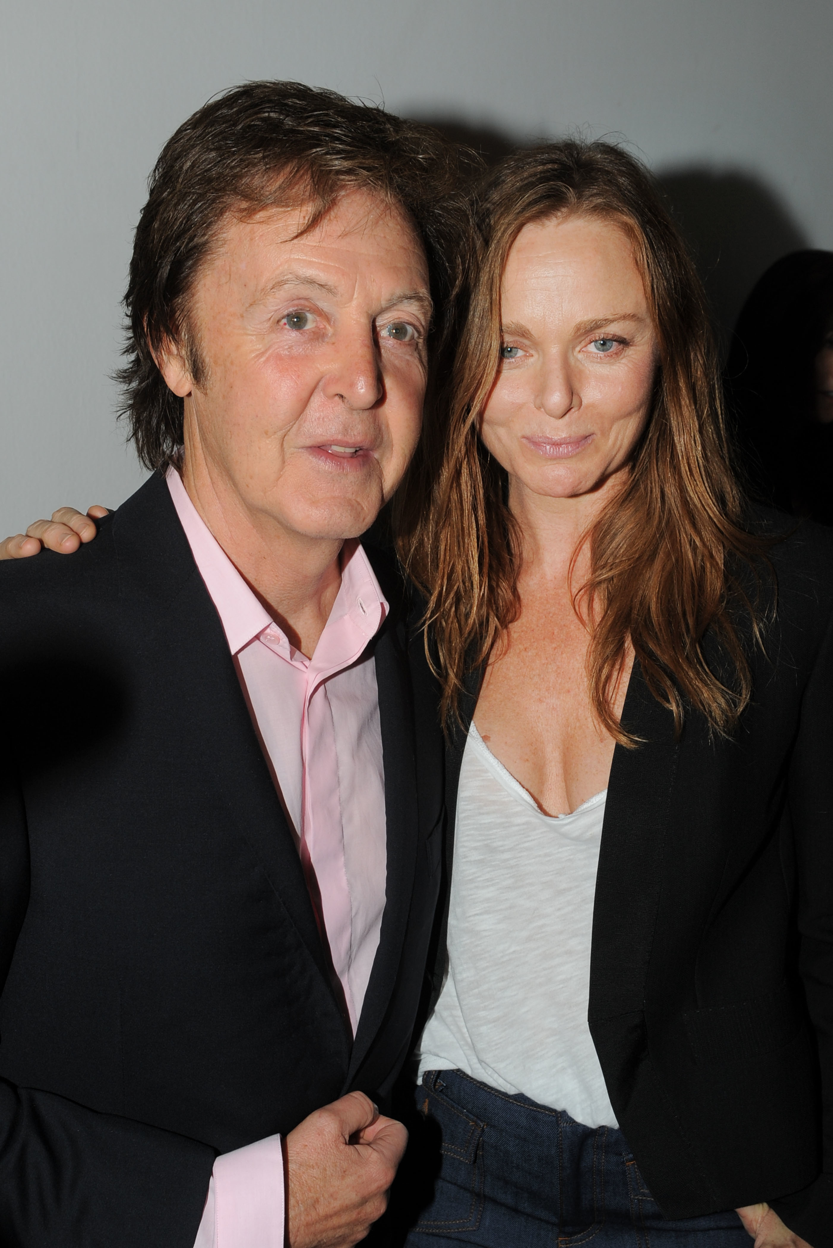 Paul McCartney with Stella McCartney at "Stella McCartney" ready-to-wear Spring/Summer 2010 collection during Paris Fashion Week, on October 5, 2009. | Source: Getty Images