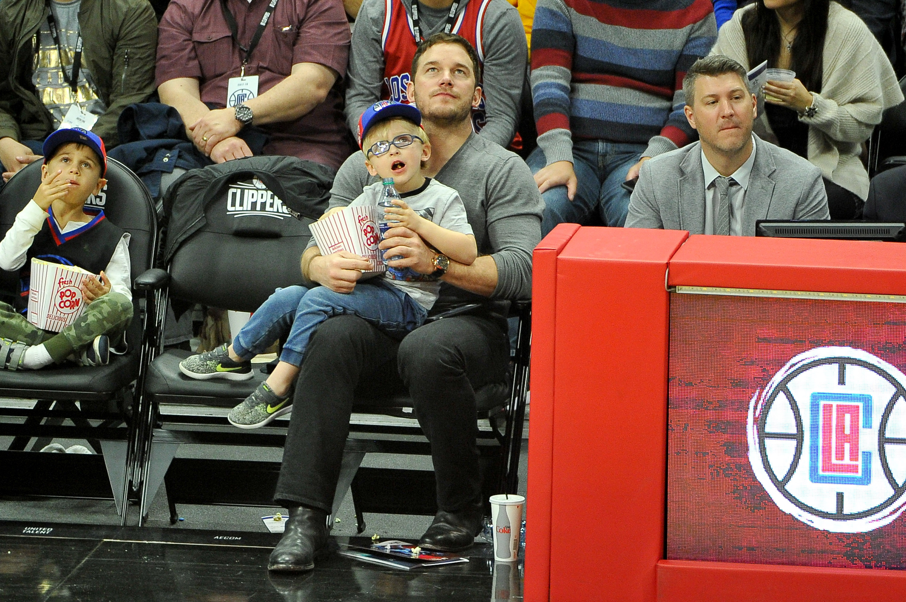 Chris Pratt and Jack Pratt attend a basketball game between the Los Angeles Clippers and the Minnesota Timberwolves at Staples Center in Los Angeles, California on December 6, 2017. | Source: Getty Images