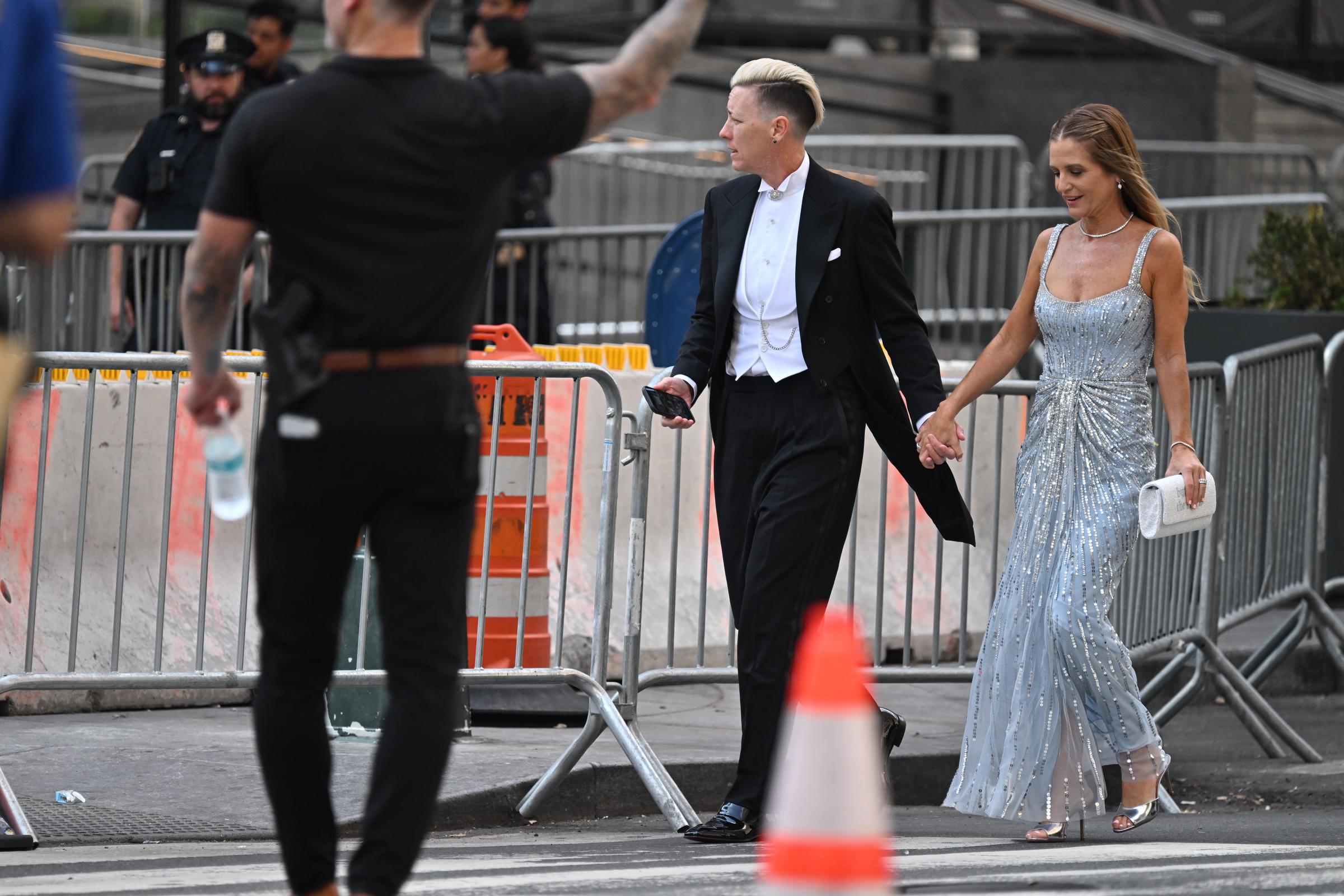 Abby Wambach and her wife, Glennon Doyle, arrive at Madison Square Garden on July 3, 2026, for Taylor Swift and Travis Kelce's wedding. Vogue reported that they were among the guests at the celebration. | Source: Getty Images