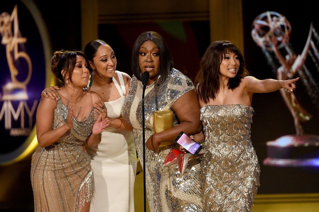 Adrienne Bailon, Tamera Mowry, Loni Love and Jeannie Mai, winners of Outstanding Entertainment Talk Show Host for "The Real," accept award onstage during the 45th annual Daytime Emmy Awards | Getty Images