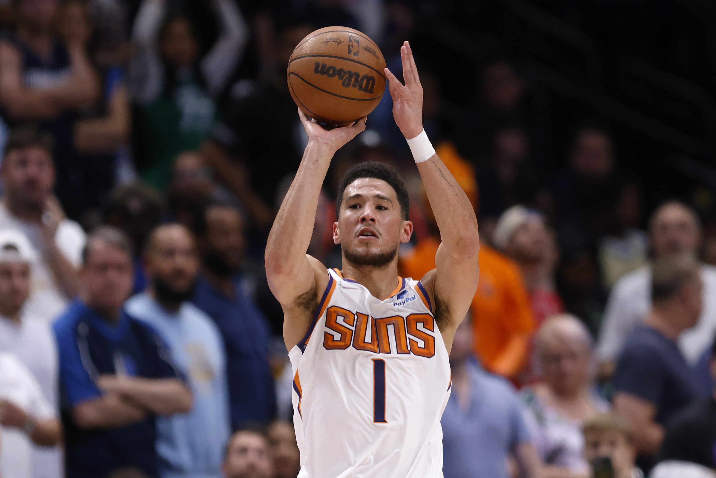 Devin Booker #1 of the Phoenix Suns shoots the ball against Dwight Powell #7 of the Dallas Mavericks in the second quarter of Game Six of the 2022 NBA Playoffs Western Conference Semifinals at American Airlines Center on May 12, 2022, in Dallas, Texas. | Source: Getty Images
