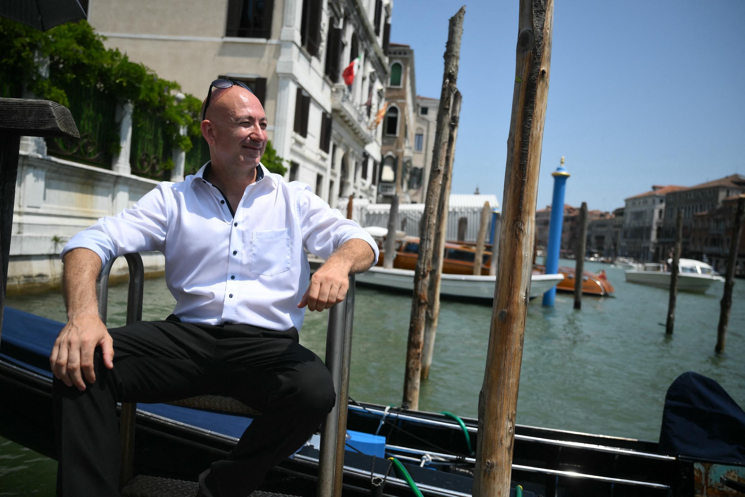German Cagdas Halicilar poses near the Aman Hotel in Venice ahead of Jeff Bezos' wedding. He is a professional Jeff Bezos look-alike.