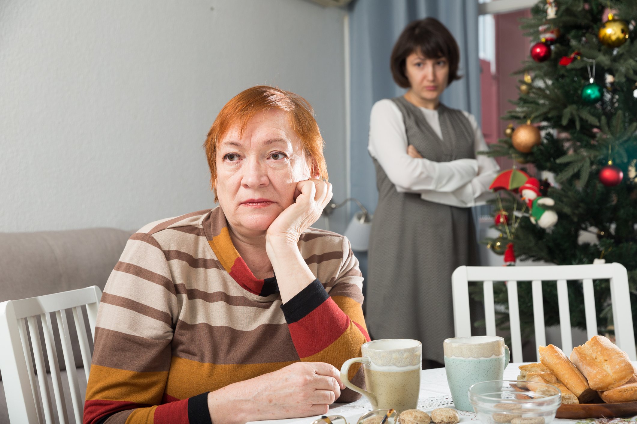 Photo of an upset mother and daughter at the Christmas table | Photo: Getty Images