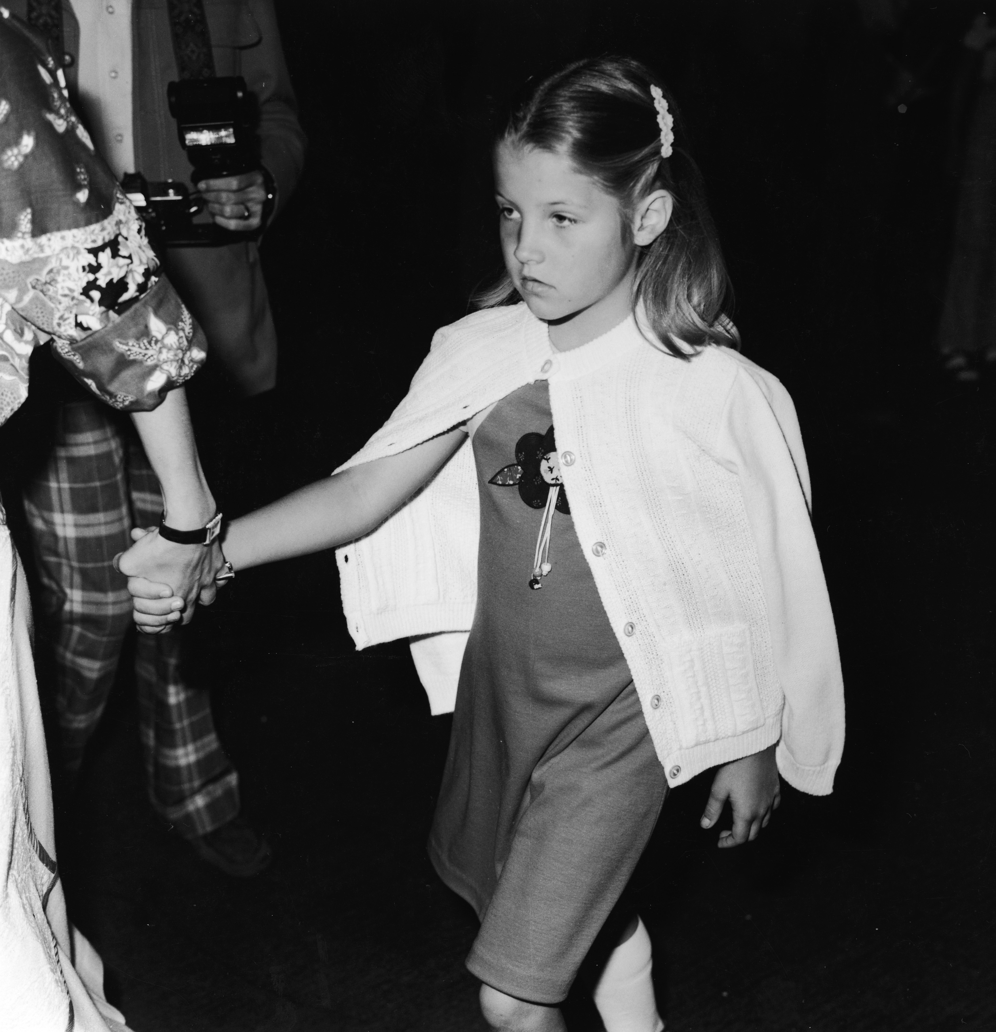 Candid photo of Lisa Marie Presley at nine years old as she attends the first ever 'Children's Premiere' benefit for the Thalians Community Mental Health Center at Cedars Cinai Medical Center in Los Angeles, March 1977. | Source: Getty Images