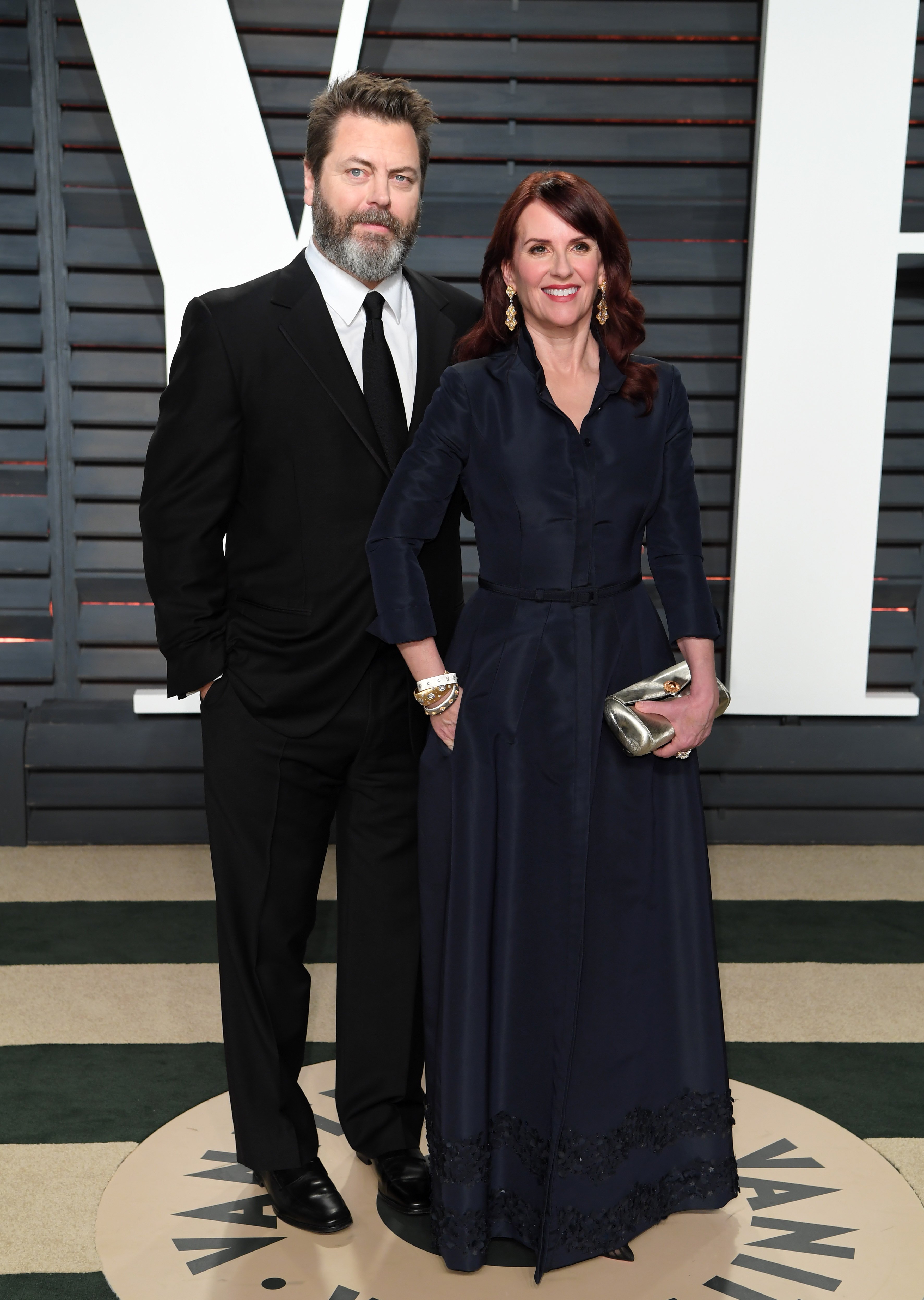  Nick Offerman and Megan Mullally arrive for the Vanity Fair Oscar Party hosted by Graydon Carter at the Wallis Annenberg Center for the Performing Arts on February 26, 2017, in Beverly Hills, California. | Source: Getty Images.