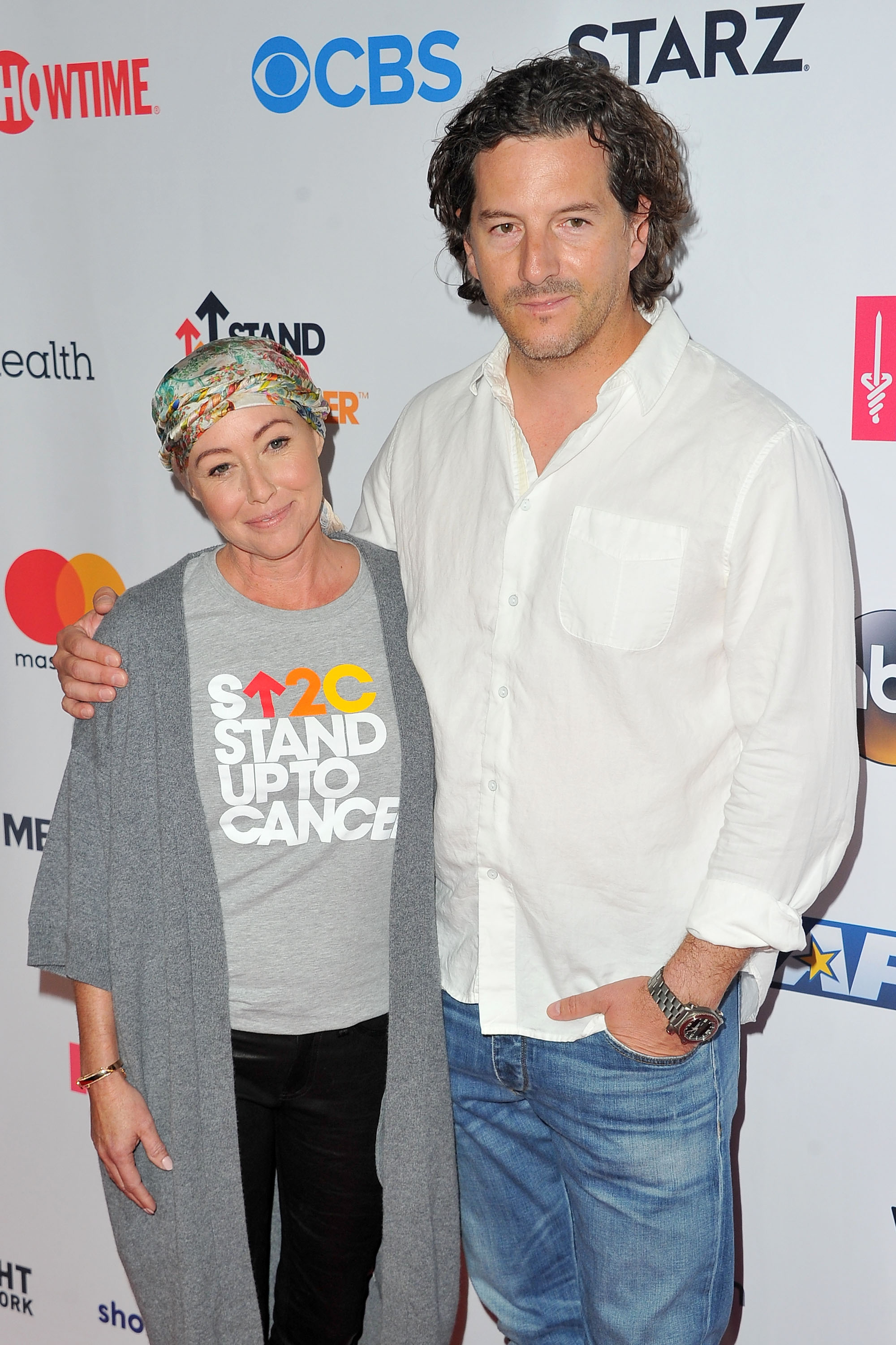 Shannen Doherty and Kurt Iswarienko arrive at the Hollywood Unites for the 5th Biennial Stand up to Cancer (SU2C) in Los Angeles, California, on September 9, 2016.  | Source: Getty Images