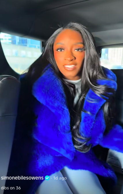 Simone Biles lip-syncing along to Raye's "Where Is My Husband!" in her TikTok video, posted on December 15, 2025. | Source: TikTok/@simonebilesowens