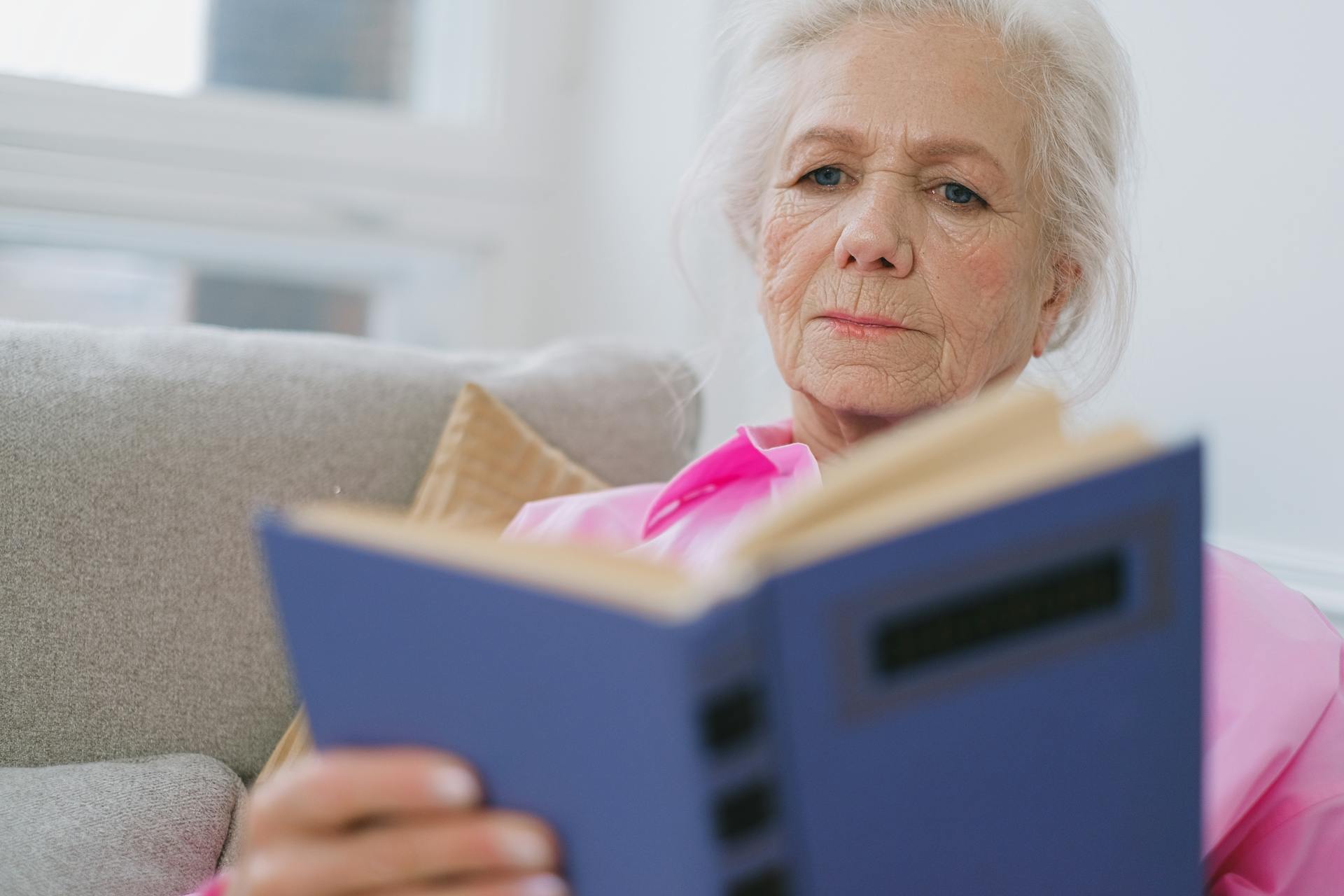 A woman reading a book | Source: Pexels