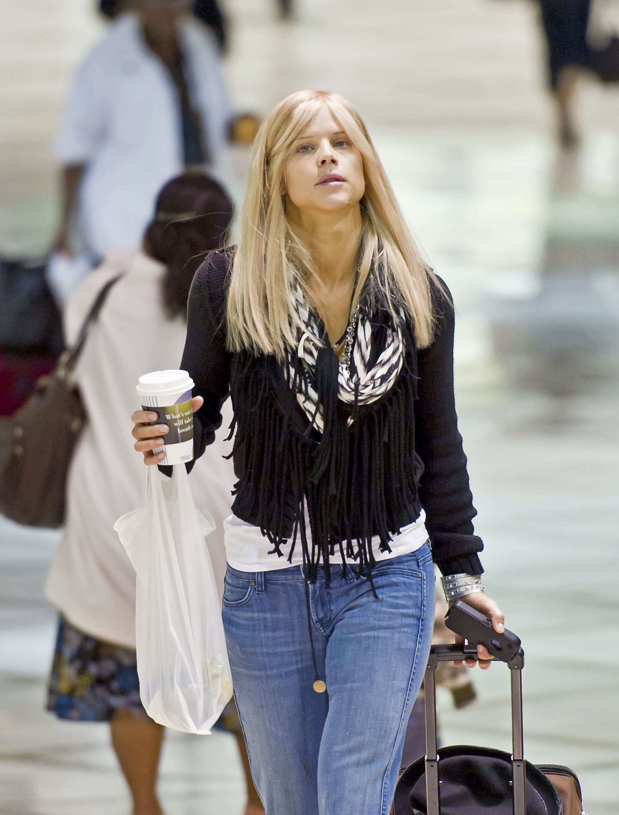 Elin Nordegren at Los Angeles International Airport on February 16, 2011, in Los Angeles, California | Source: Getty Images