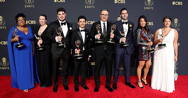 John Oliver poses in the press room with fellow writers during the 73rd Primetime Emmy Awards, September 2021 | Source: Getty Images