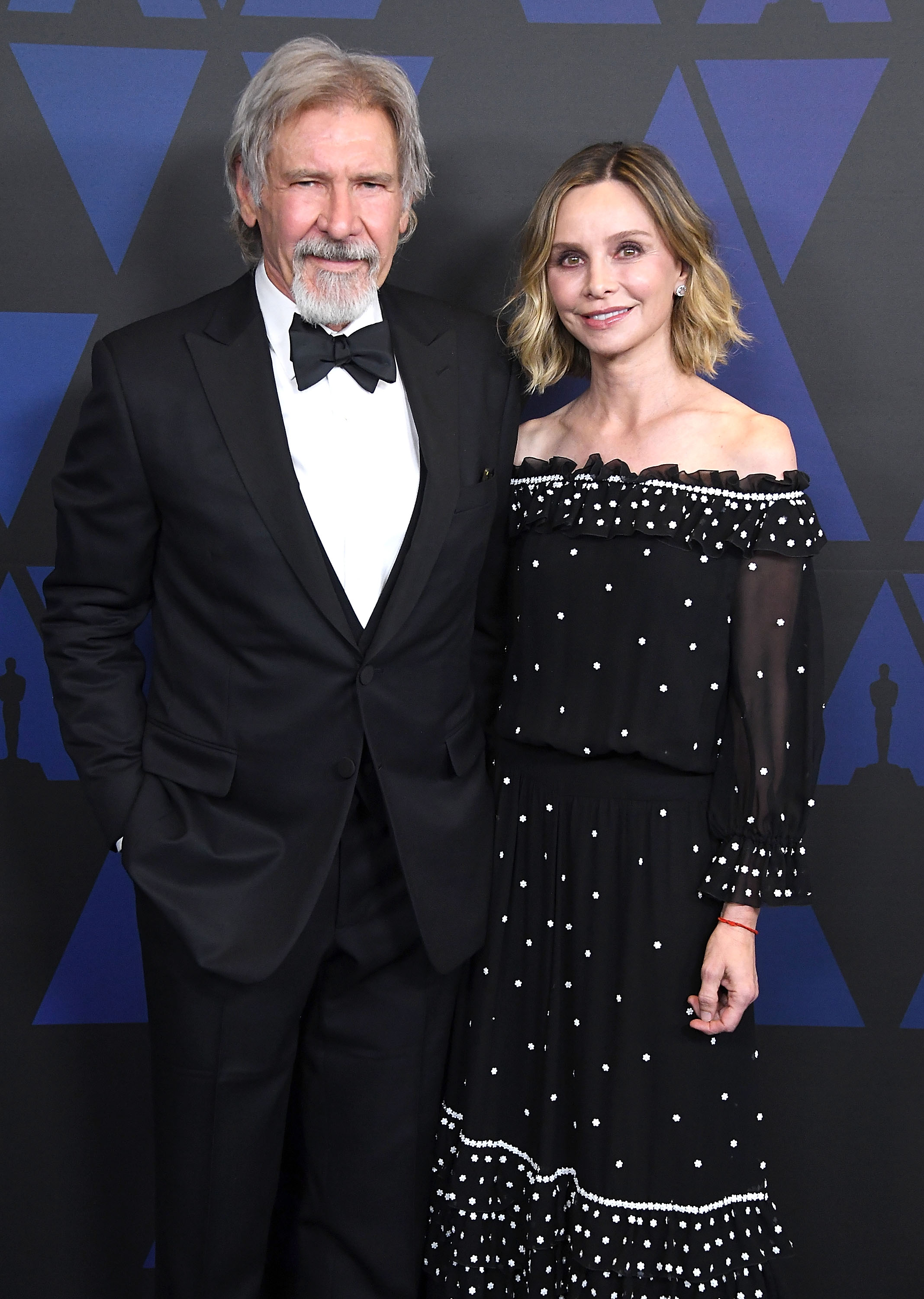 Actor Harrison Ford and his wife, actress Calista Flockhart arrive at the Academy Of Motion Picture Arts And Sciences' 10th Annual Governors Awards at The Ray Dolby Ballroom at Hollywood & Highland Center on November 18, 2018 in Hollywood, California ┃Source: Getty Images