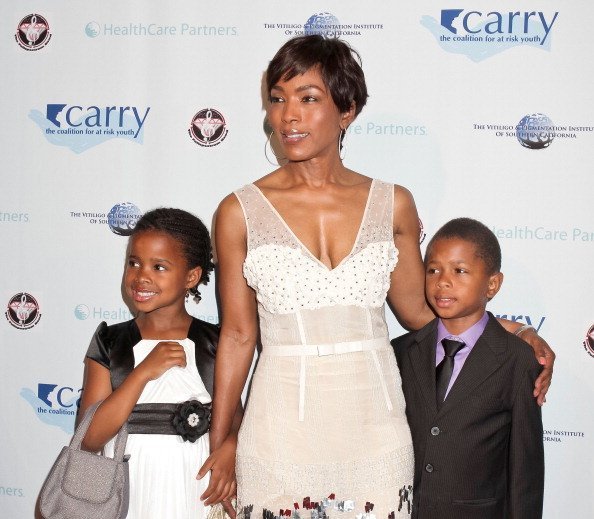 Angela Bassett, Bronwyn Vance and Slater Vance at The Coalition For At-Risk Youth (CARRY) "Shall We Dance" Gala on May 11, 2013 in California | Photo: Getty Images