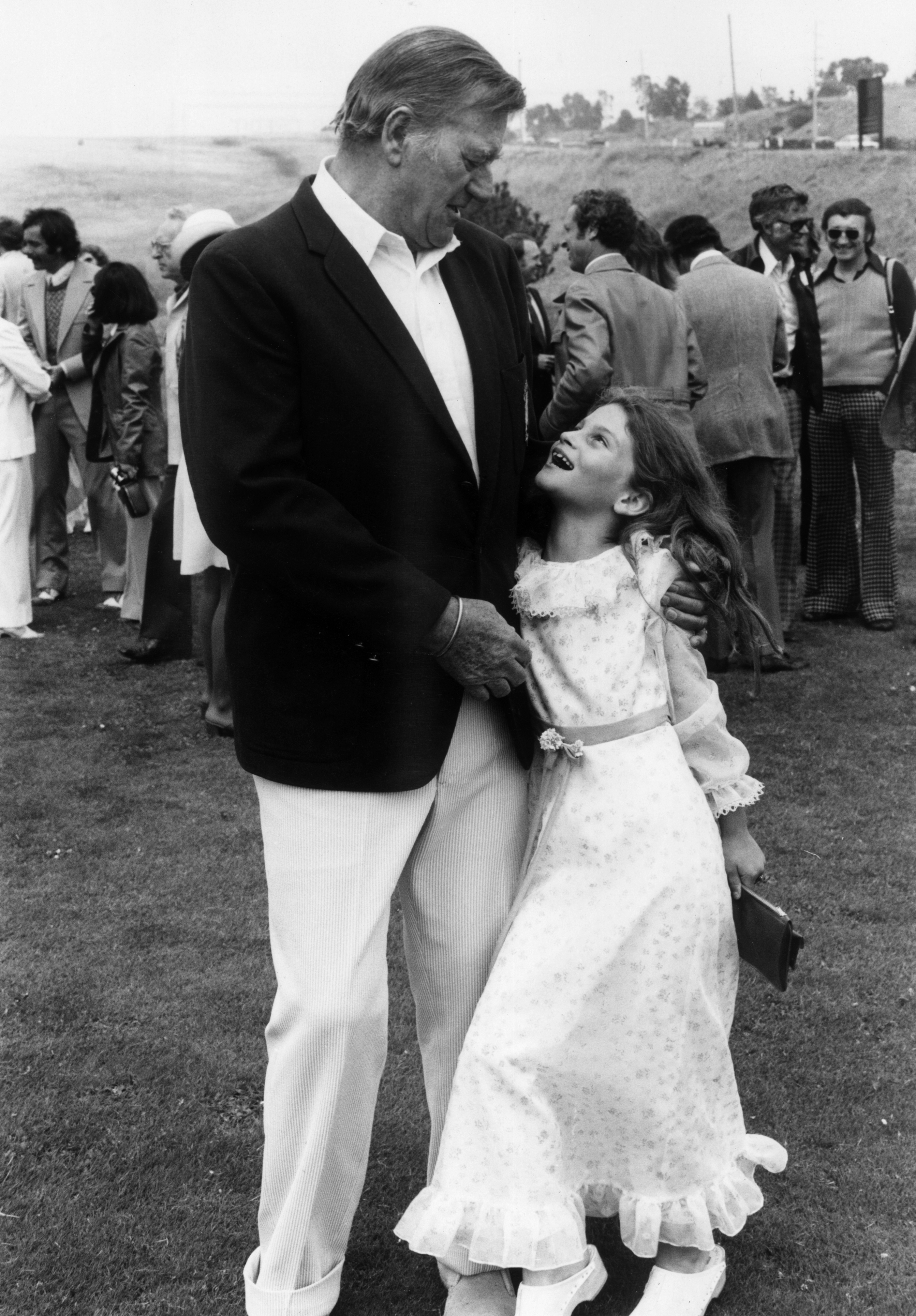 John Wayne with Aissa Wayne, circa 1976 | Source: Getty Images