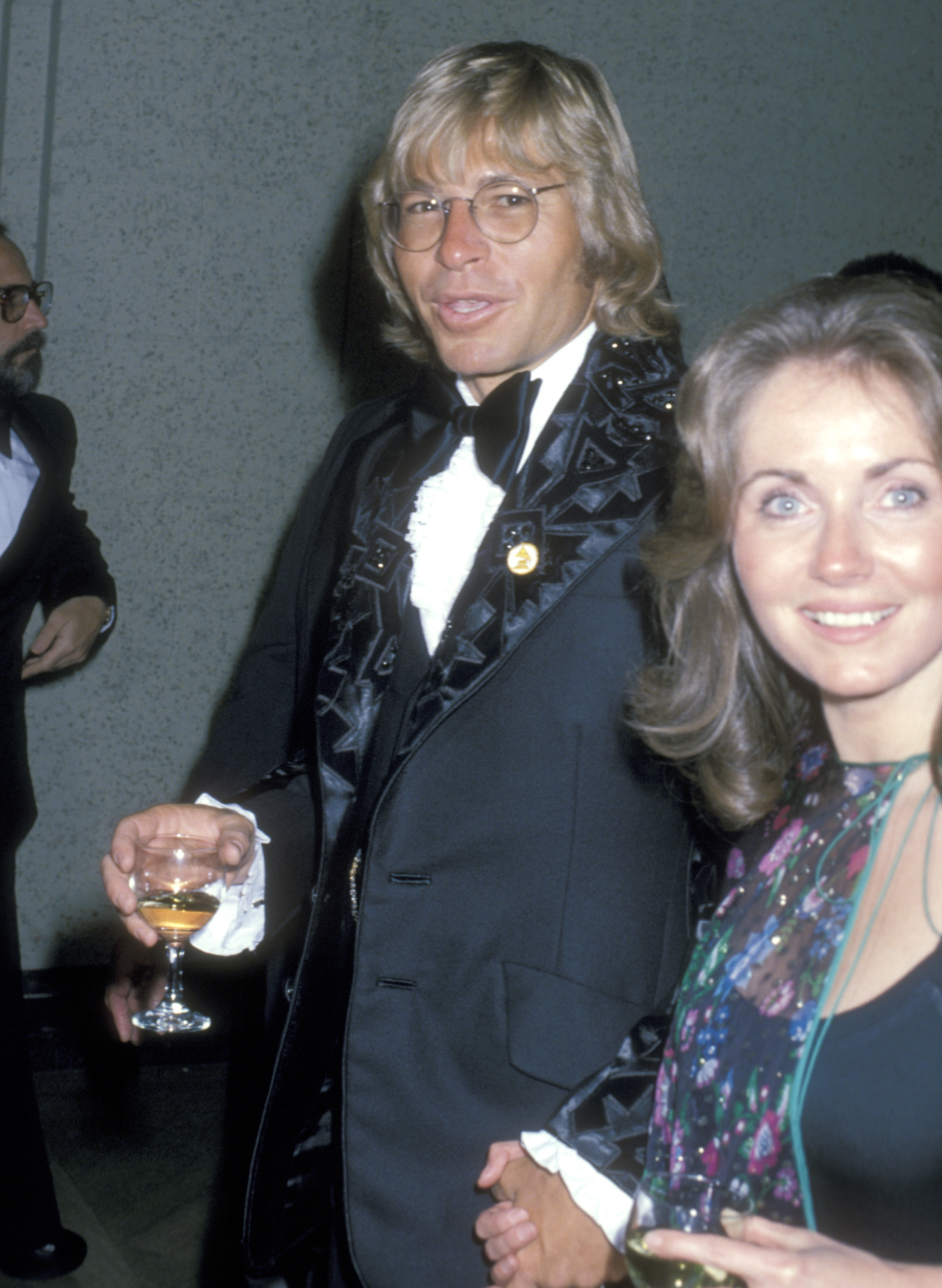 John Denver and Annie Martell at the 20th Annual Grammy Awards on February 23, 1978, in Los Angeles, California. | Source: Getty Images