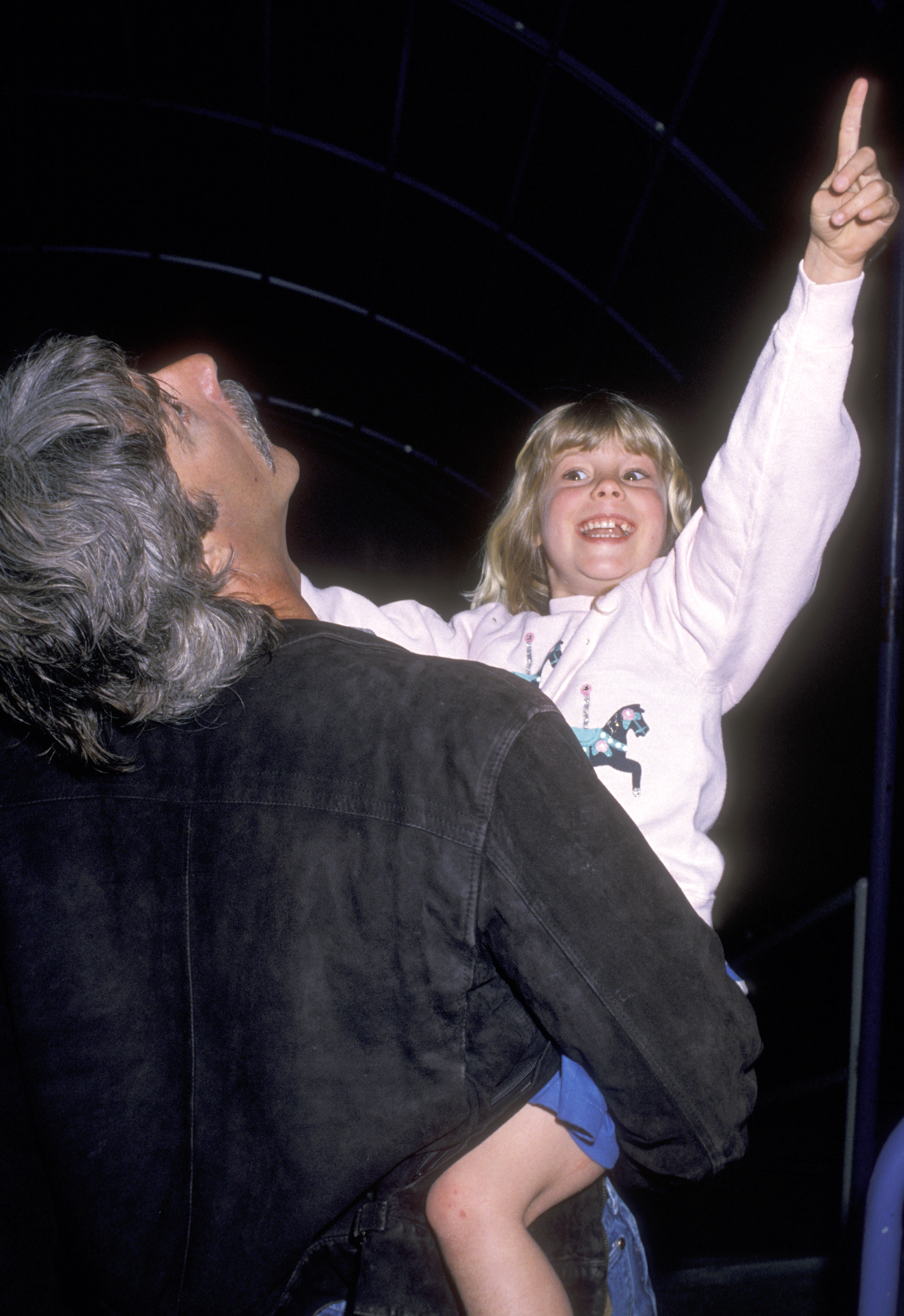 Actor Sam Elliott and daughter Cleo Elliott attend the "Moscow Circus Opening" at Great Western Forum in Inglewood, California, March 14, 1990. | Source: Getty Images