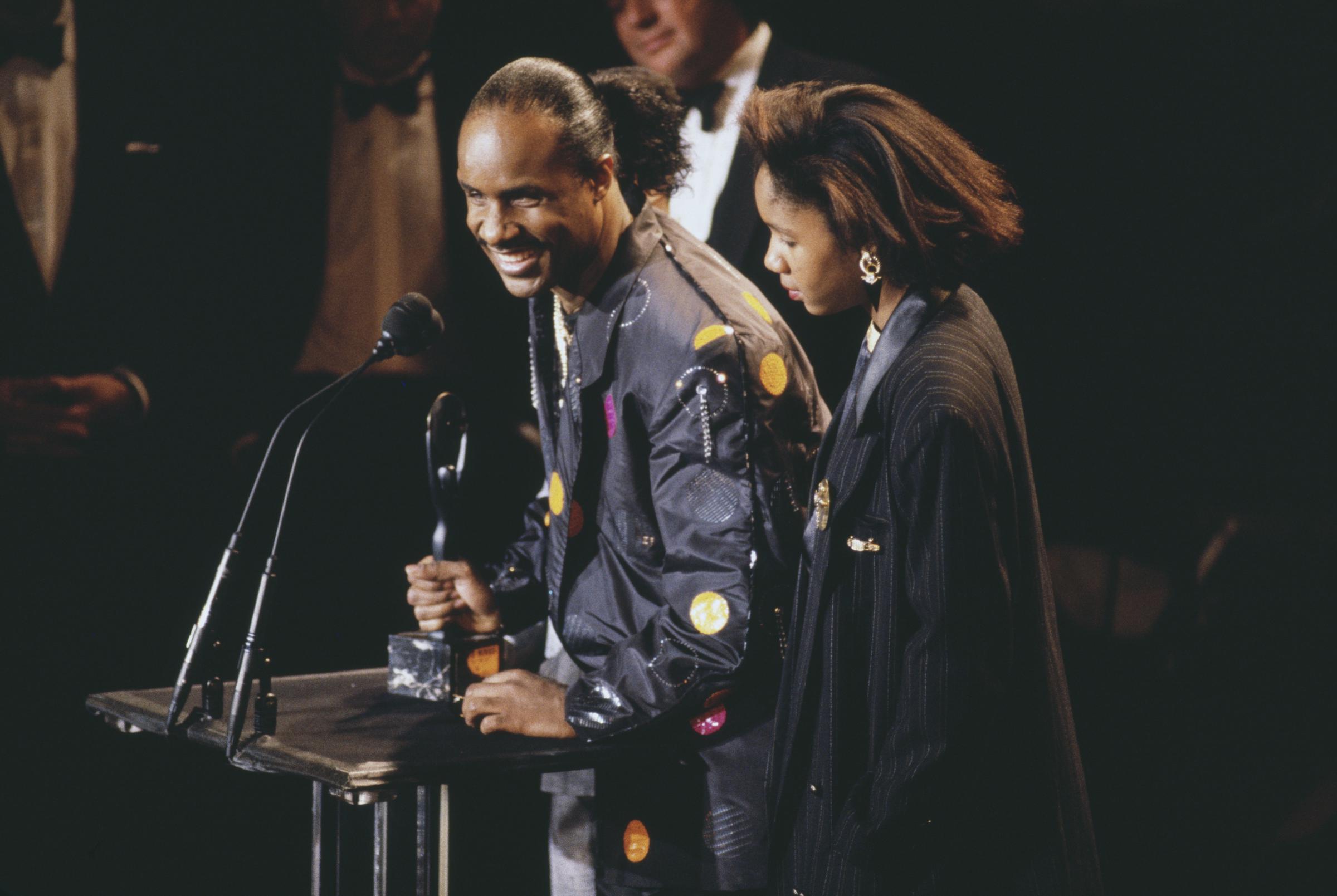 Stevie Wonder and Aisha Morris attend the 1989 Rock & Roll Hall of Fame Induction Ceremony on January 1, 1989, in New York City. | Source: Getty Images