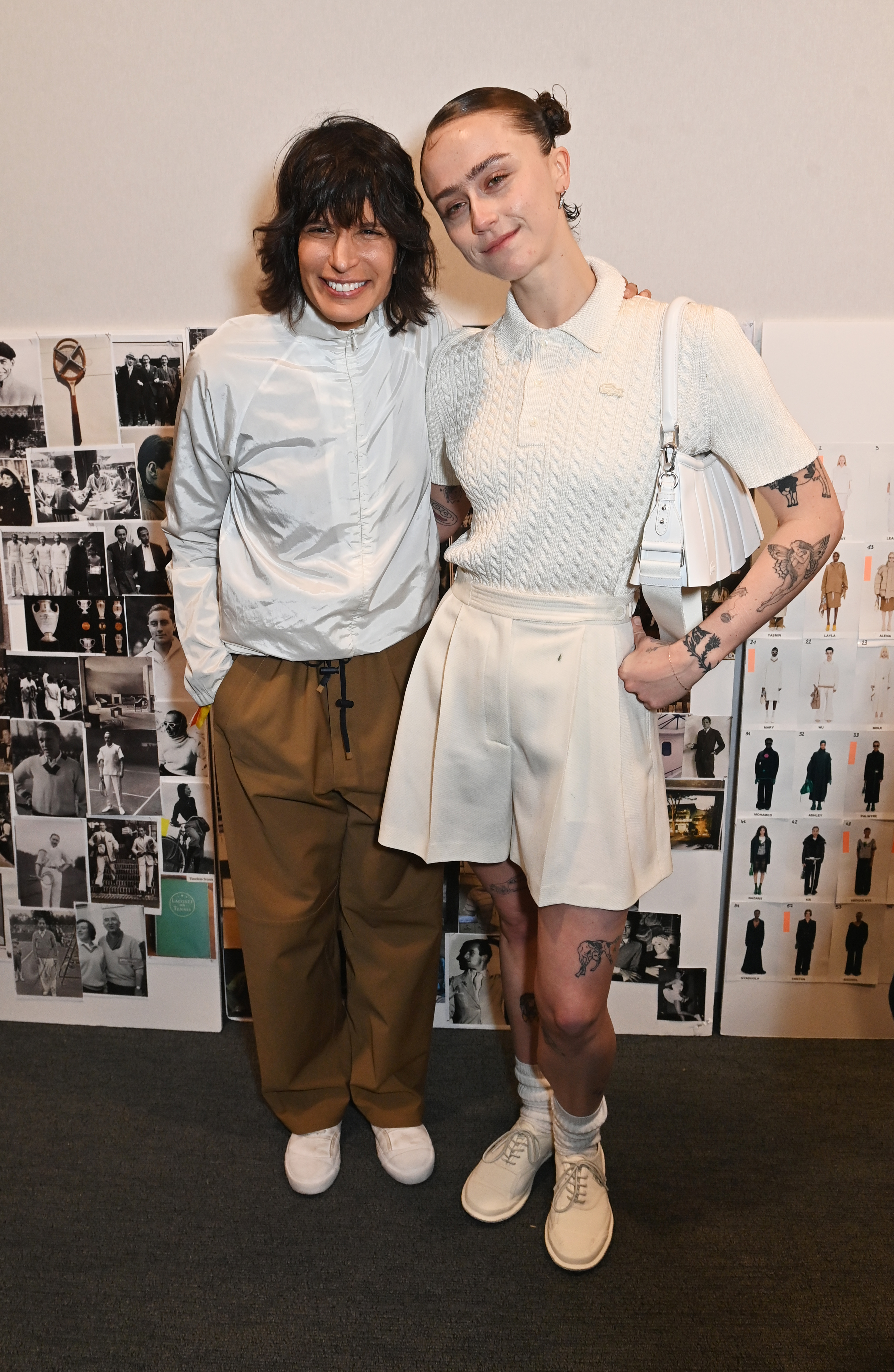 Ella Emhoff posing with Lacoste creative director Pelagia Kolotouros at the show. | Source: Getty Images