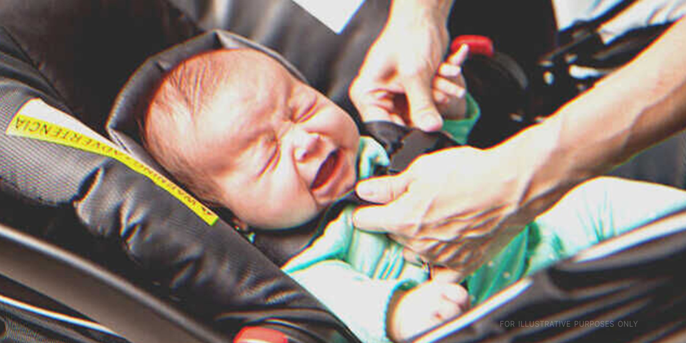 Schreiendes Baby im Tragebettchen | Quelle: Shutterstock