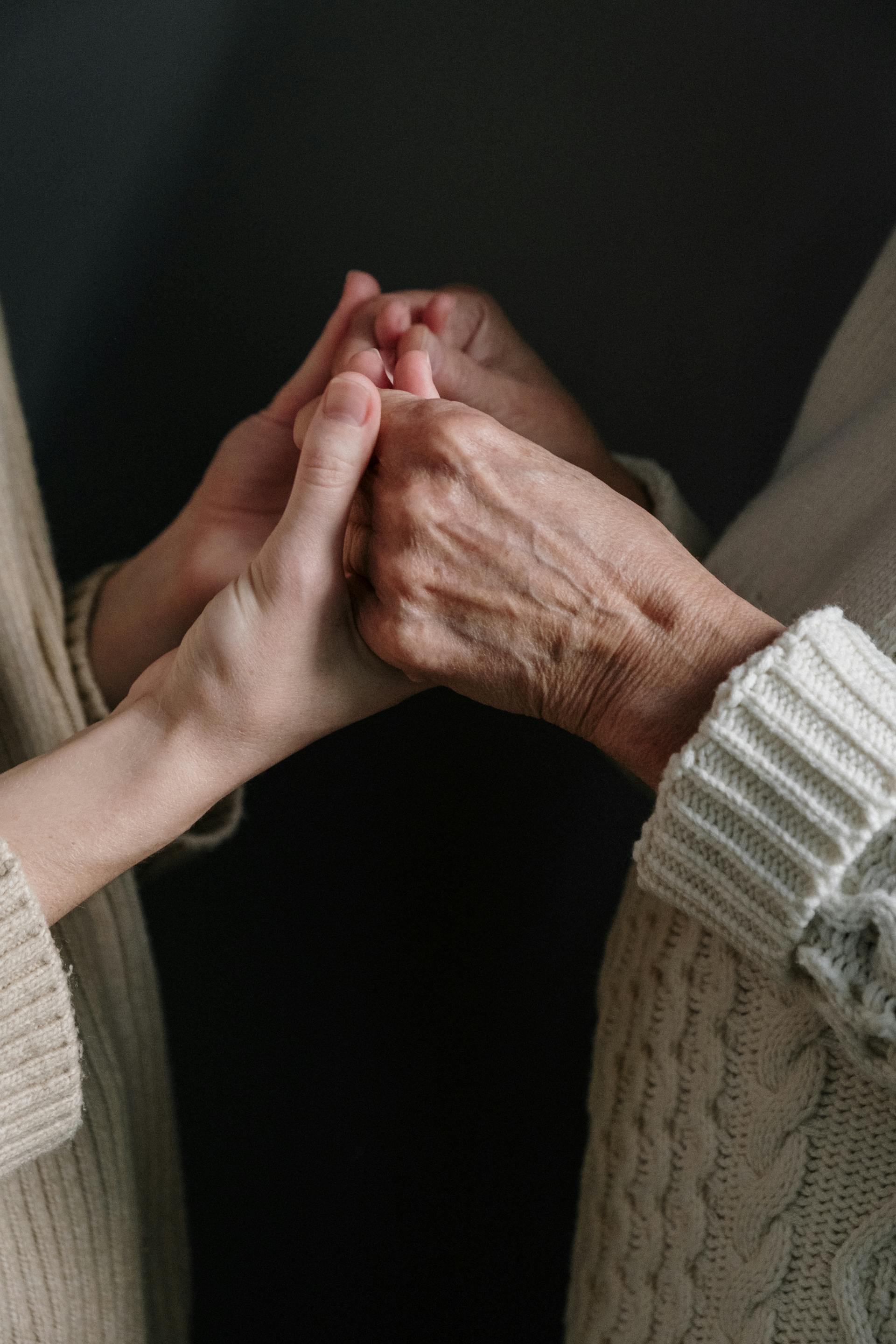 A close-up shot of two women holding hands | Source: Pexels