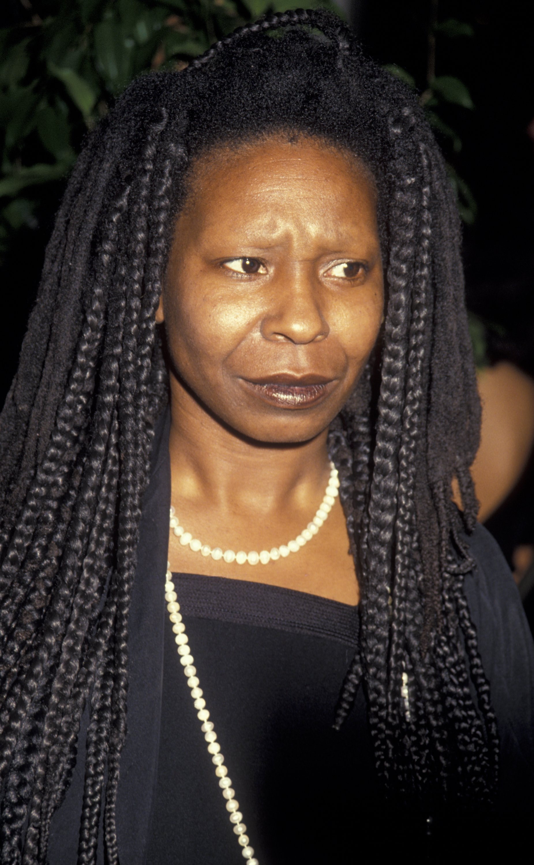 Actress Whoopi Goldberg attends 12th Annual ACE Awards on January 13, 1991 at the Wiltern Theater in Los Angeles, California. | Source: Getty Images
