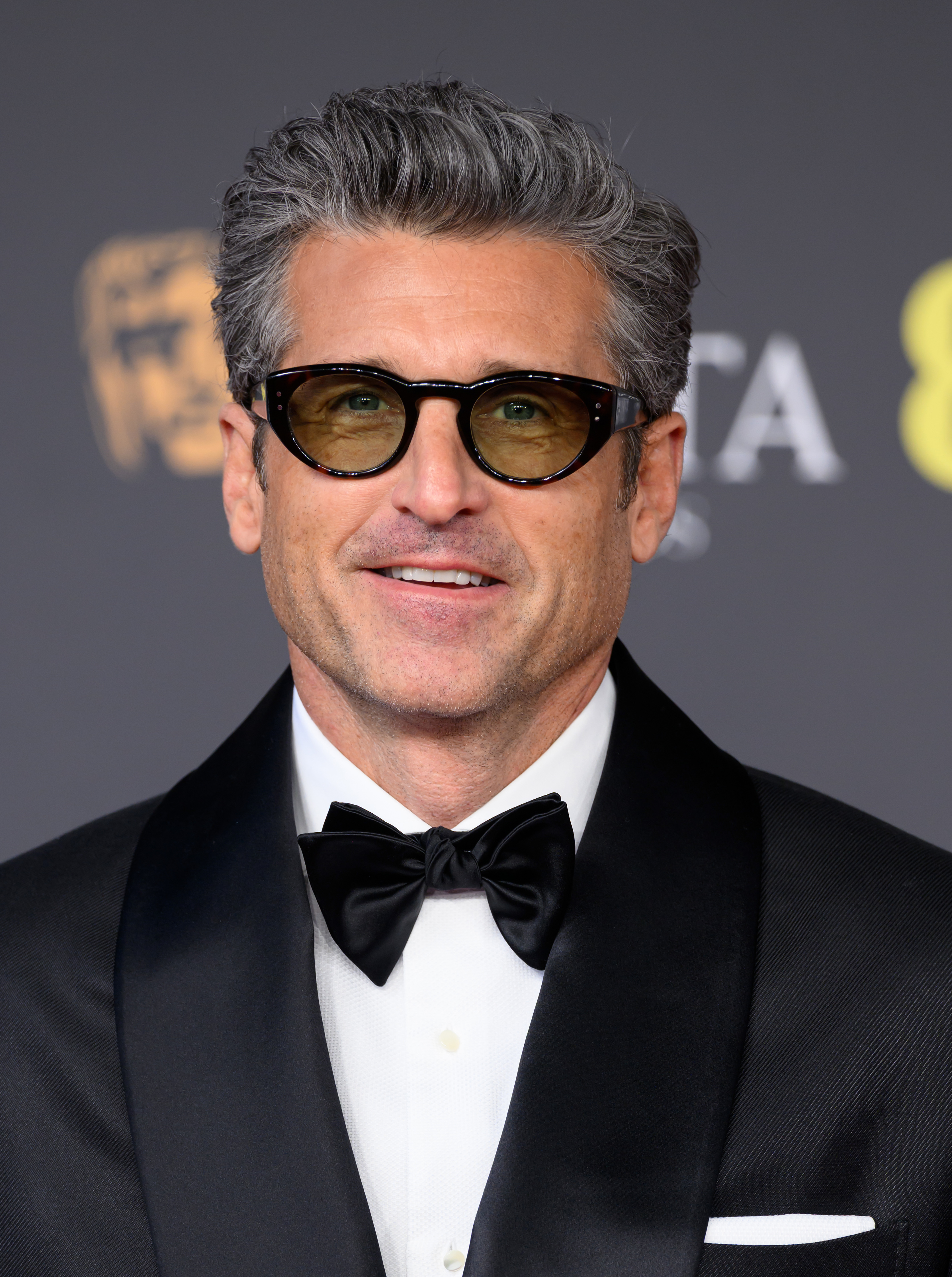 A close up photo of Patrick Dempsey at the 2026 EE BAFTA Film Awards in London, England on February 22. | Source: Getty Images