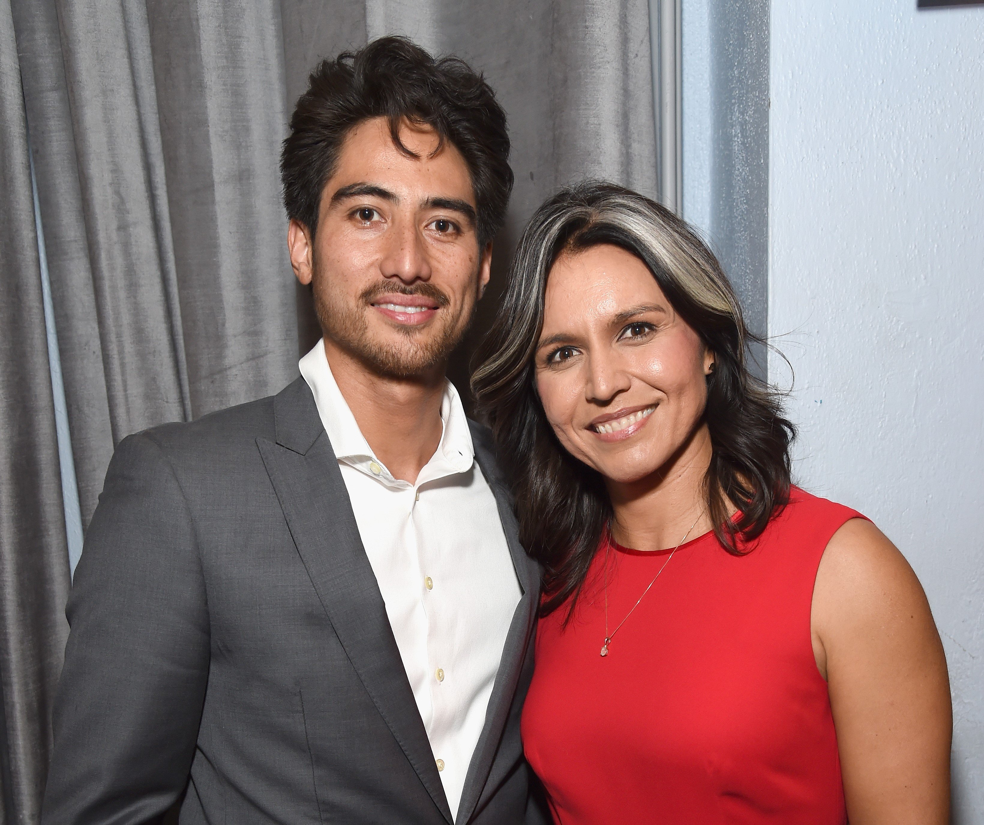 Abraham Williams (L) and Tulsi Gabbard attend the Sean Penn CORE Gala at The Wiltern on January 5, 2019, in Los Angeles, California. | Source: Getty Images 