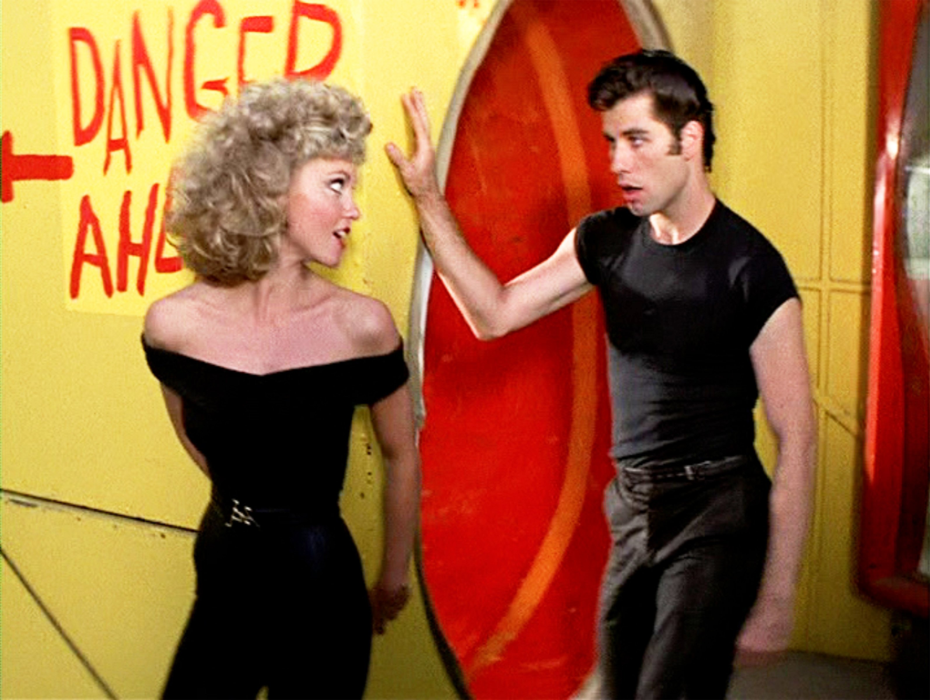 Olivia Newton-John as Sandy Olsson and John Travolta as Danny Zuko singing "You're the One That I Want," in "Grease" on June 16, 1978. / Source: Getty Images