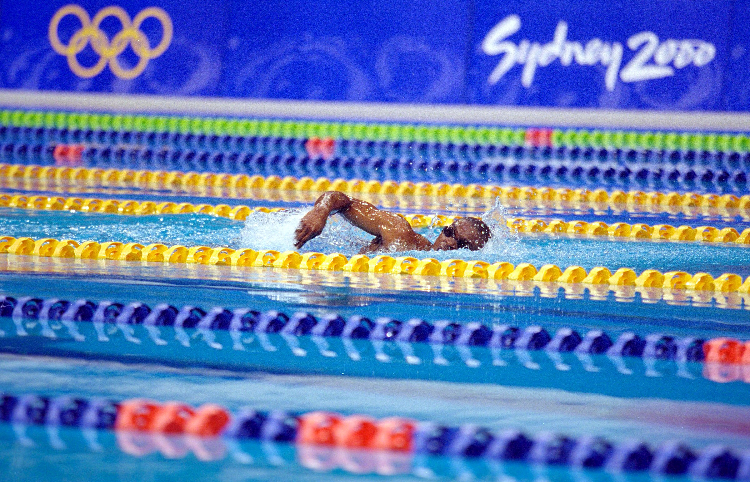 Eric Moussambani swims alone in the Men's 100m Freestyle Heat at the Sydney 2000 Olympic Games, on September 19, 2000, in Sydney, Australia | Source: Getty Images