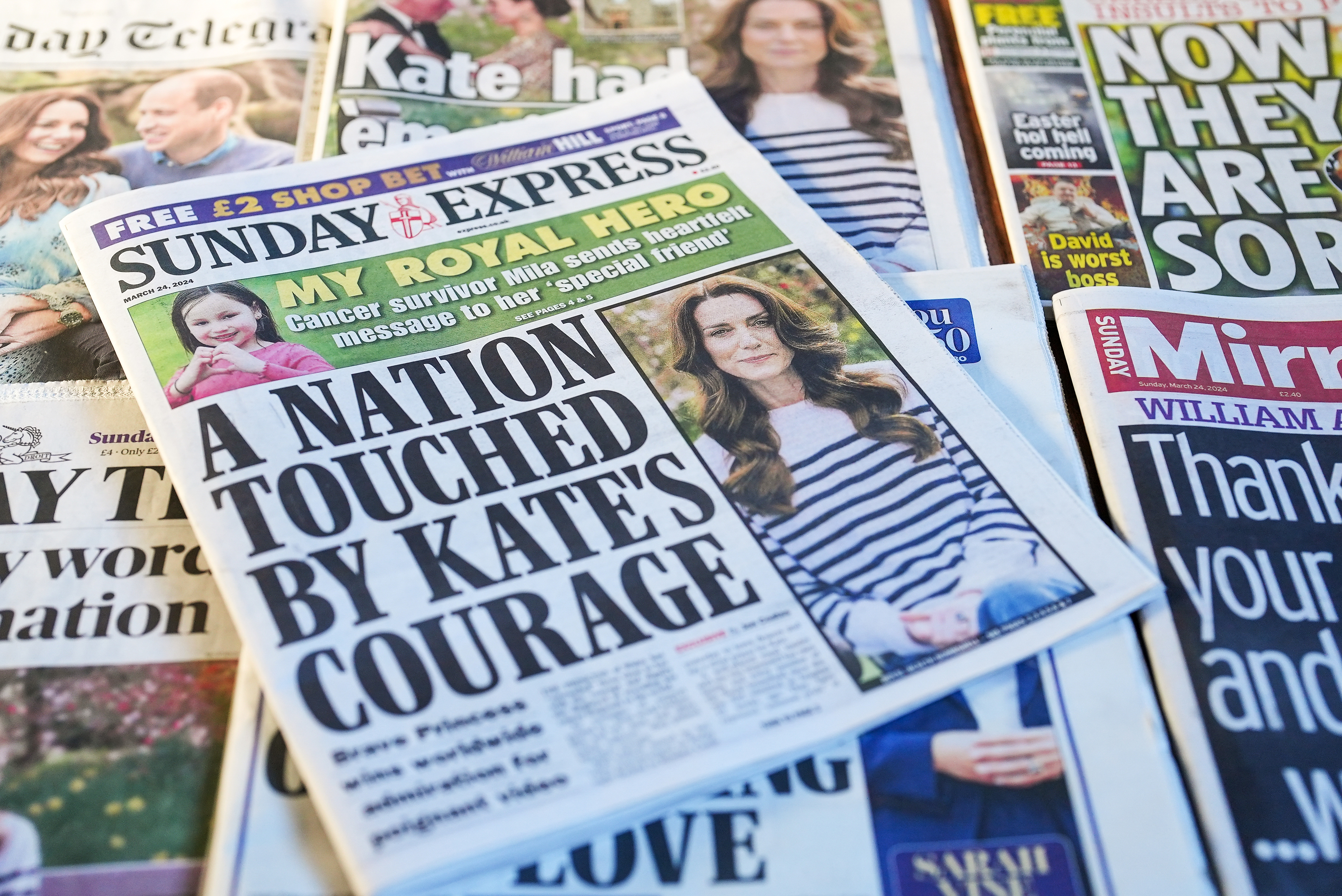 UK newspapers cover Kate Middleton, Princess of Wales' recent announcement of her cancer diagnosis, on March 24, 2024, in London, England | Source: Getty Images