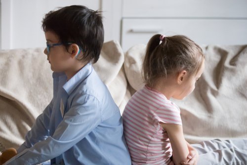 Two unhappy preschoolers. | Source: Shutterstock.