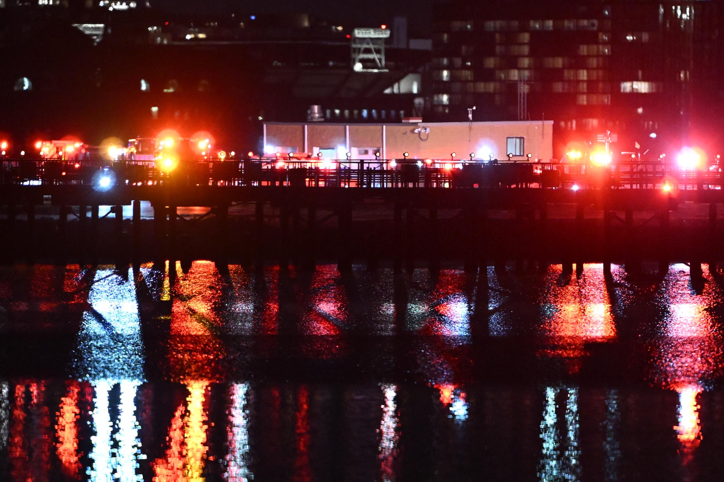 A view of the scene after a regional plane collided in midair with a military helicopter and crashed into the Potomac River, on January 30, 2025 | Source: Getty Images