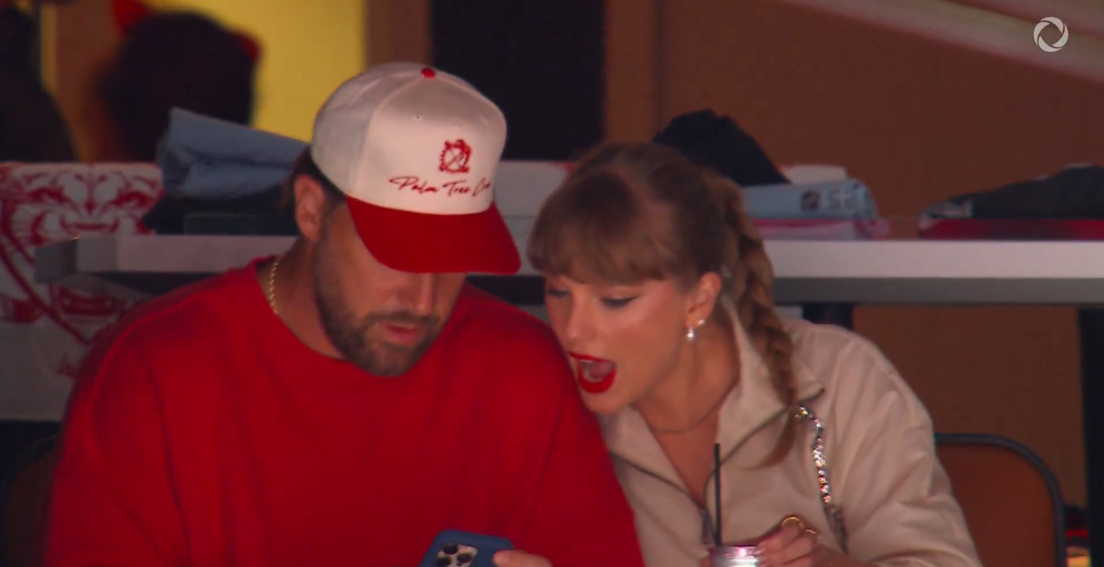 Travis Kelce and Taylor Swift looking at his phone during Game Four of the 2025 Stanley Cup Final at Amerant Bank Arena on June 12, 2025, in Sunrise, Florida | Source: X/Sportsnet