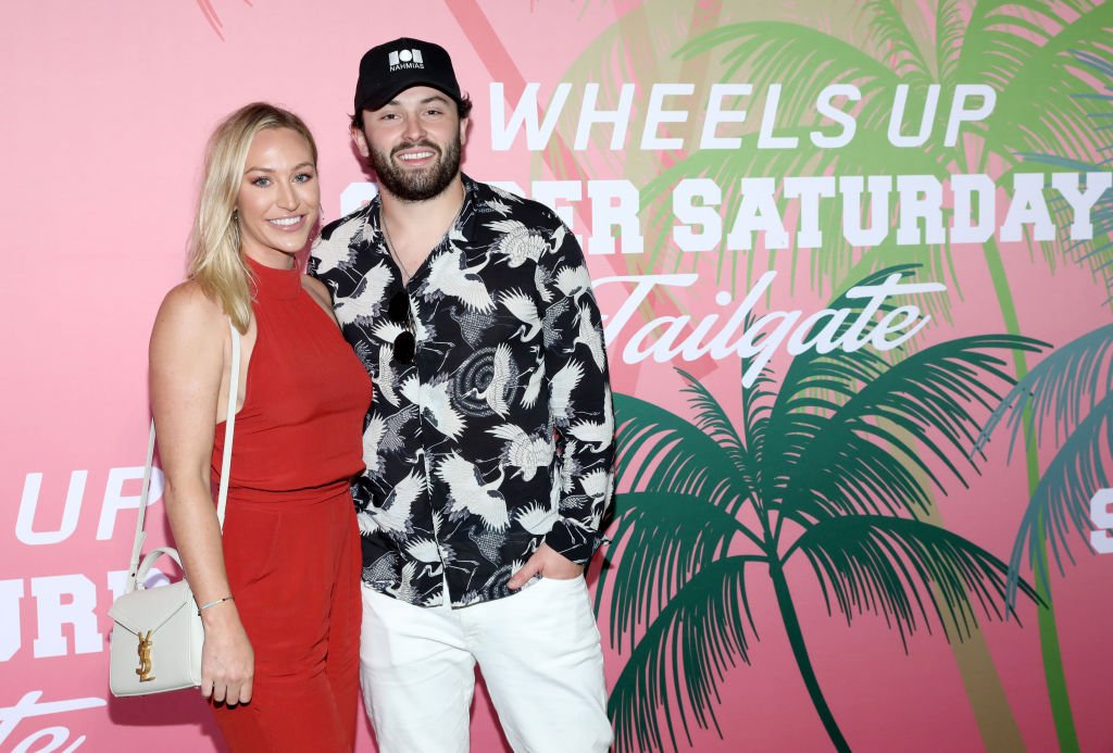 Emily Wilkinson and Baker Mayfield at Wheels Up members-only Super Saturday Tailgate event on February 1, 2020 | Photo: Getty Images