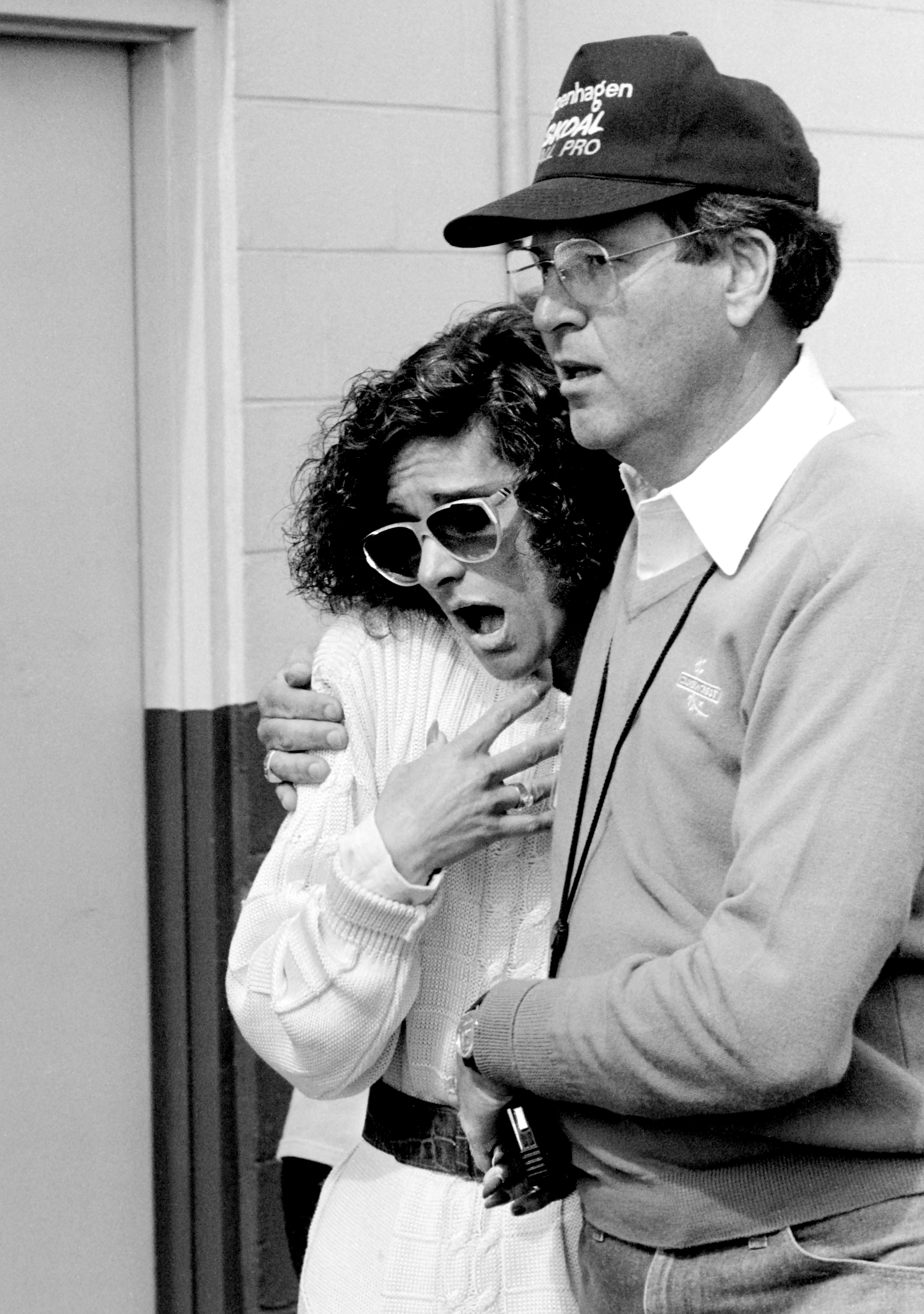 Pattie Petty is escorted by Johnny Hayes to the infield medical center after NASCAR driver Richard Petty, was involved in a crash during the running of the 1988 Daytona 500 stock car race at Daytona International Speedway in Daytona Beach, Florida, on February 01, 1988. | Source: Getty Images