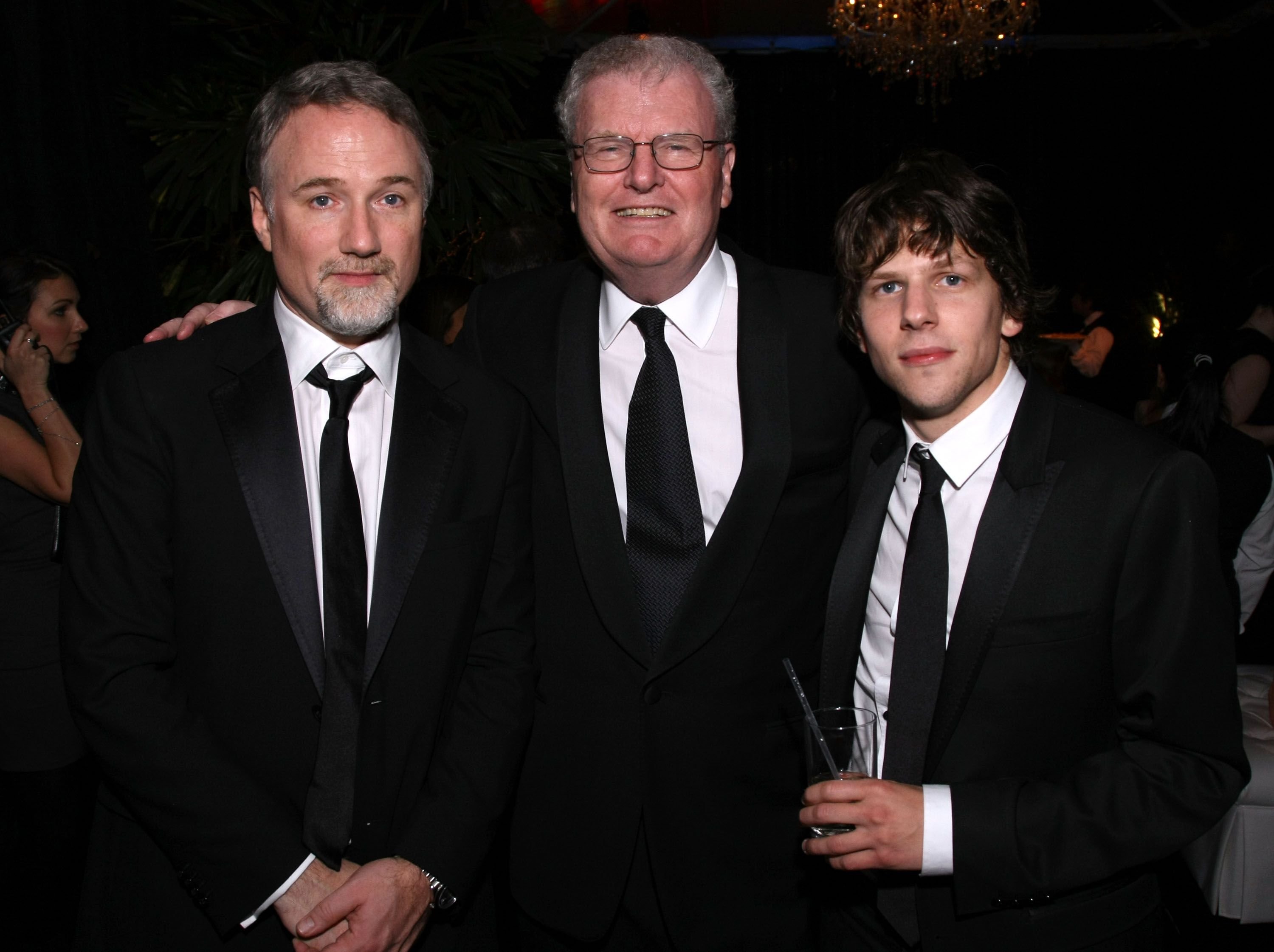 David Fincher, Sir Howard Stringer and actor Jesse Eisenberg at 68th Annual Golden Globe Awards Party held in 2011 in Beverly Hills | Source: Getty Images