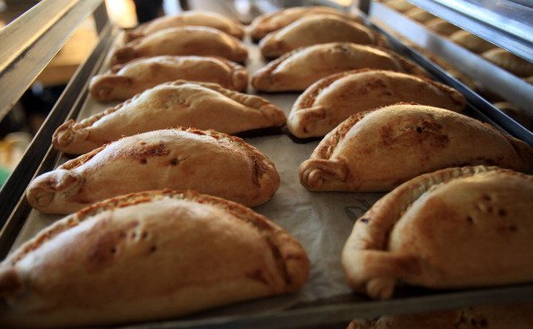  Freshly baked pasties are taken out of the oven at the World Cornish Pasty Championships at The Eden Project | Photo: Getty Images