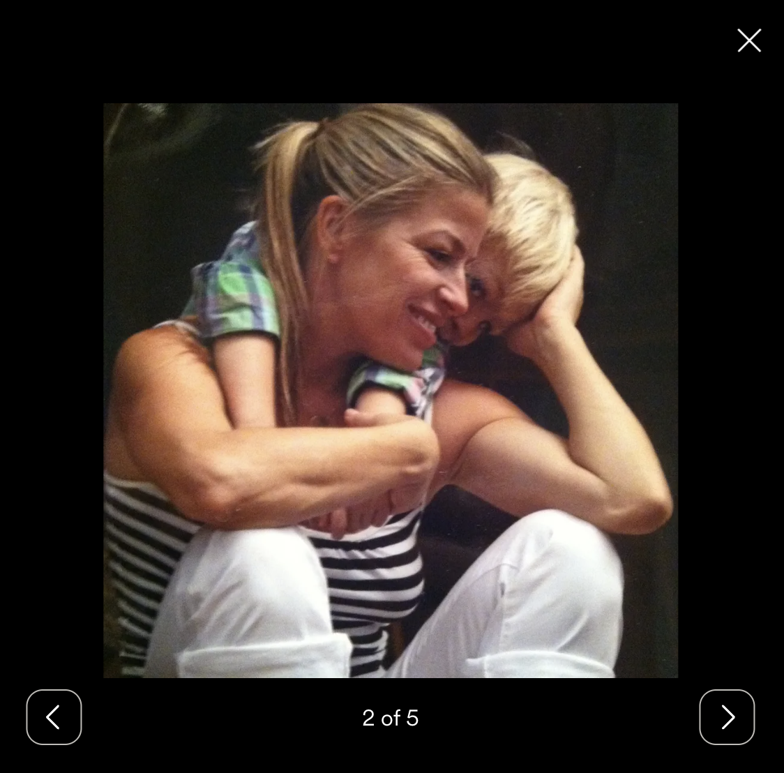 A young Evan Clark is pictured hugging his mom, Sandra Malibu Sweeney | Source: gofundme