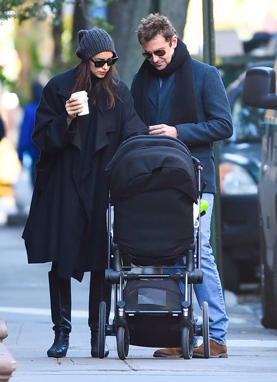 Irina Shayk and Bradley Cooper seen walking in Soho with baby Lea De Seine Shayk Cooper on October 24, 2018, in New York City | Source: Getty Images