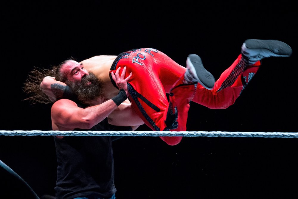 Luke Harper wrestling Nakamura at WWE Live at the Palau Sant Jordi on November 4, 2017, in Barcelona, Spain | Photo: Shutterstock/Christian Bertrand