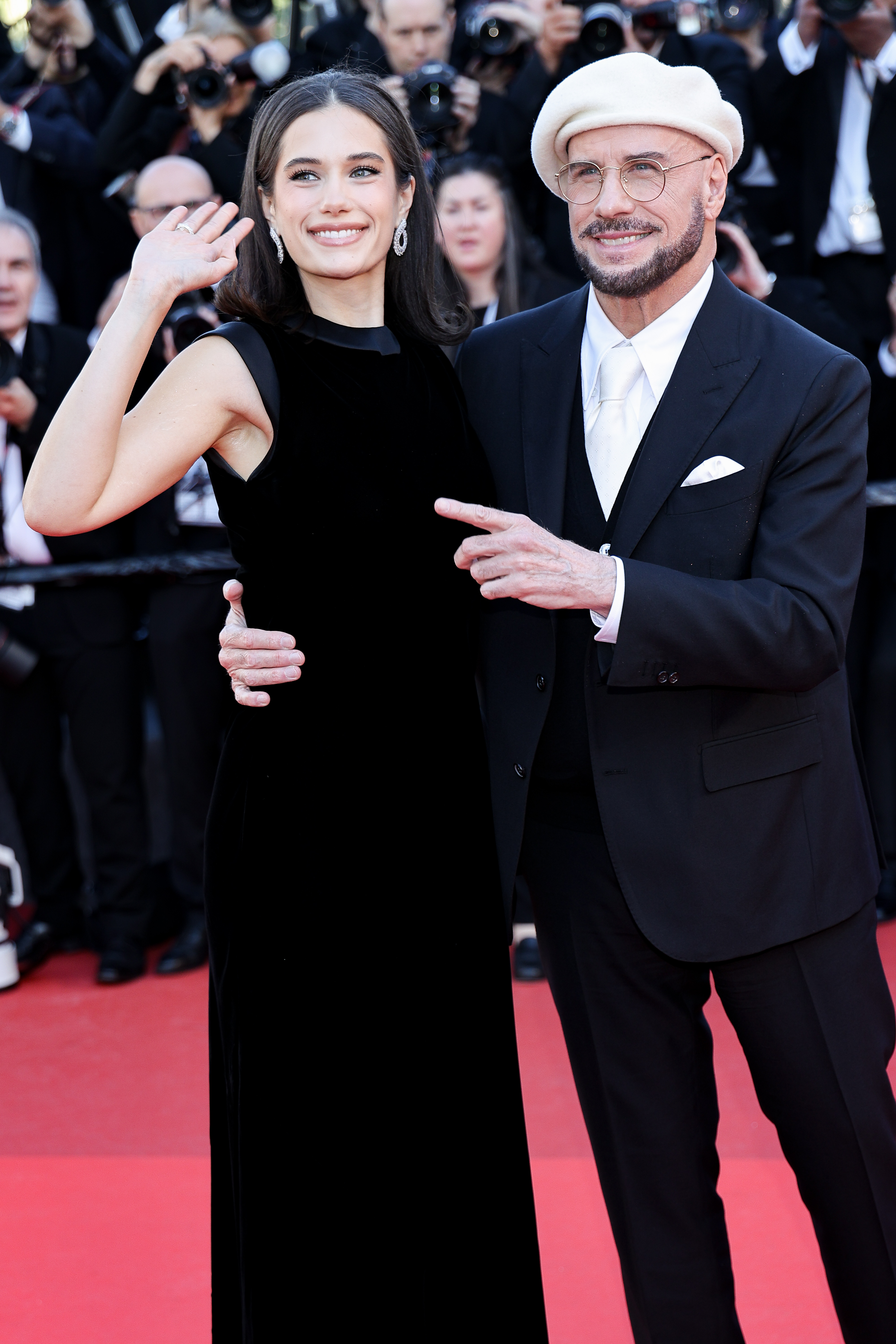 Ella Bleu and John Travolta attend the "Karma" screening during the 79th annual Cannes Film Festival on May 15, 2026 | Source: Getty Images