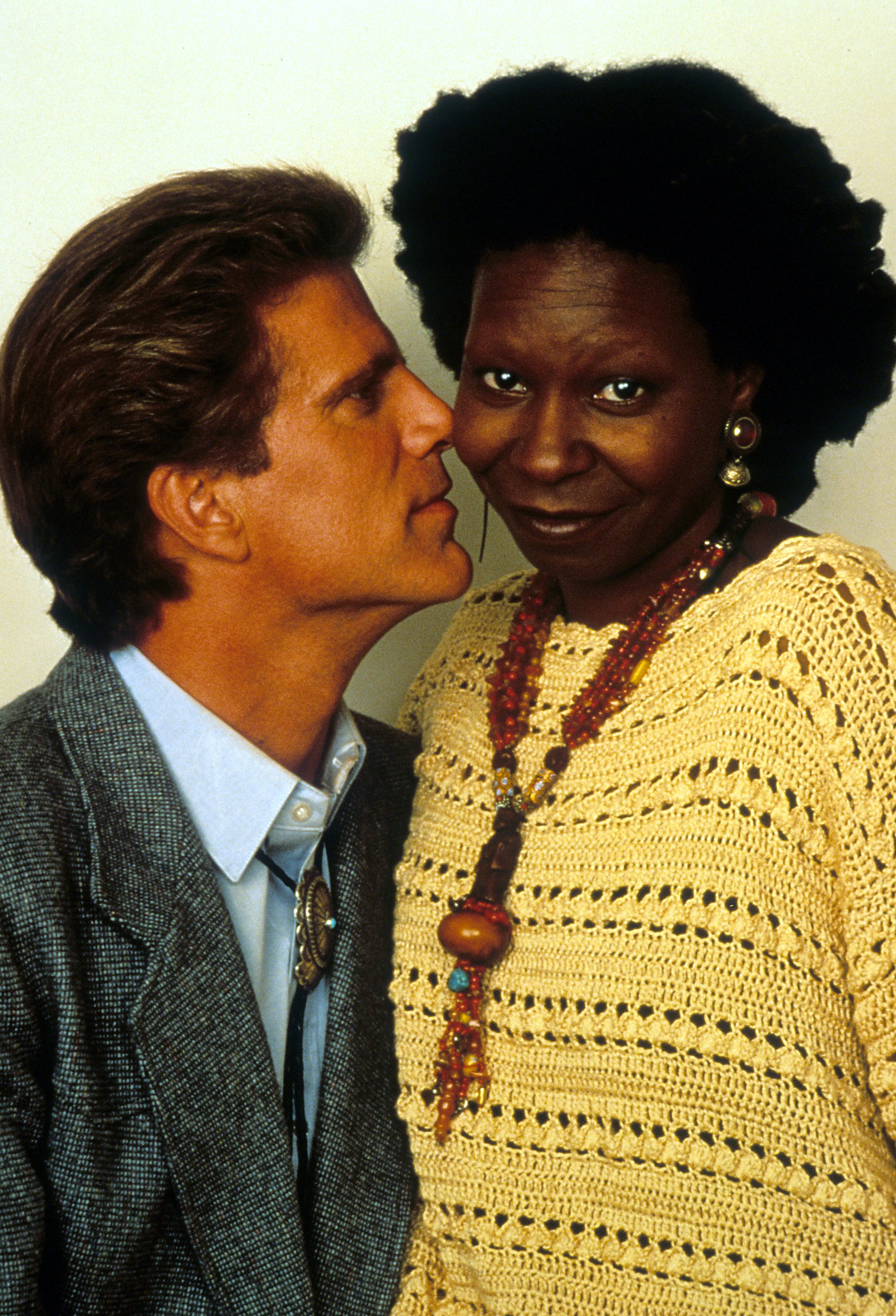 Actress Whoopi Goldberg posing next to Ted Danson in a scene from the film "Made In America"  in 1993 | Photo: Getty Images