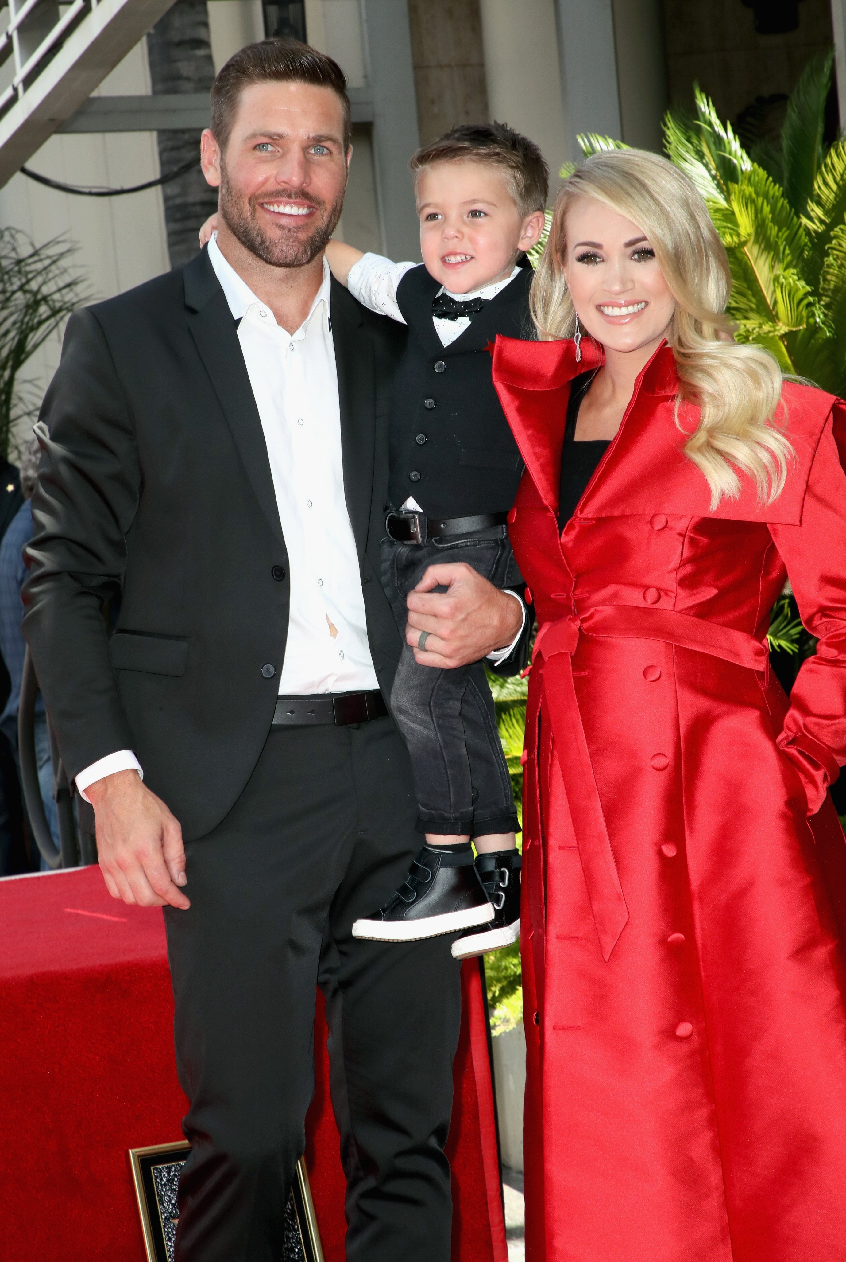 Mike Fisher, Carrie Underwood, and son Isaiah Michael Fisher at Underwood's Hollywood Walk of Fame ceremony in Los Angeles | Photo: Getty Images